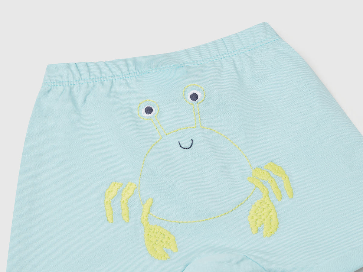 Shorts con patch sul retro
