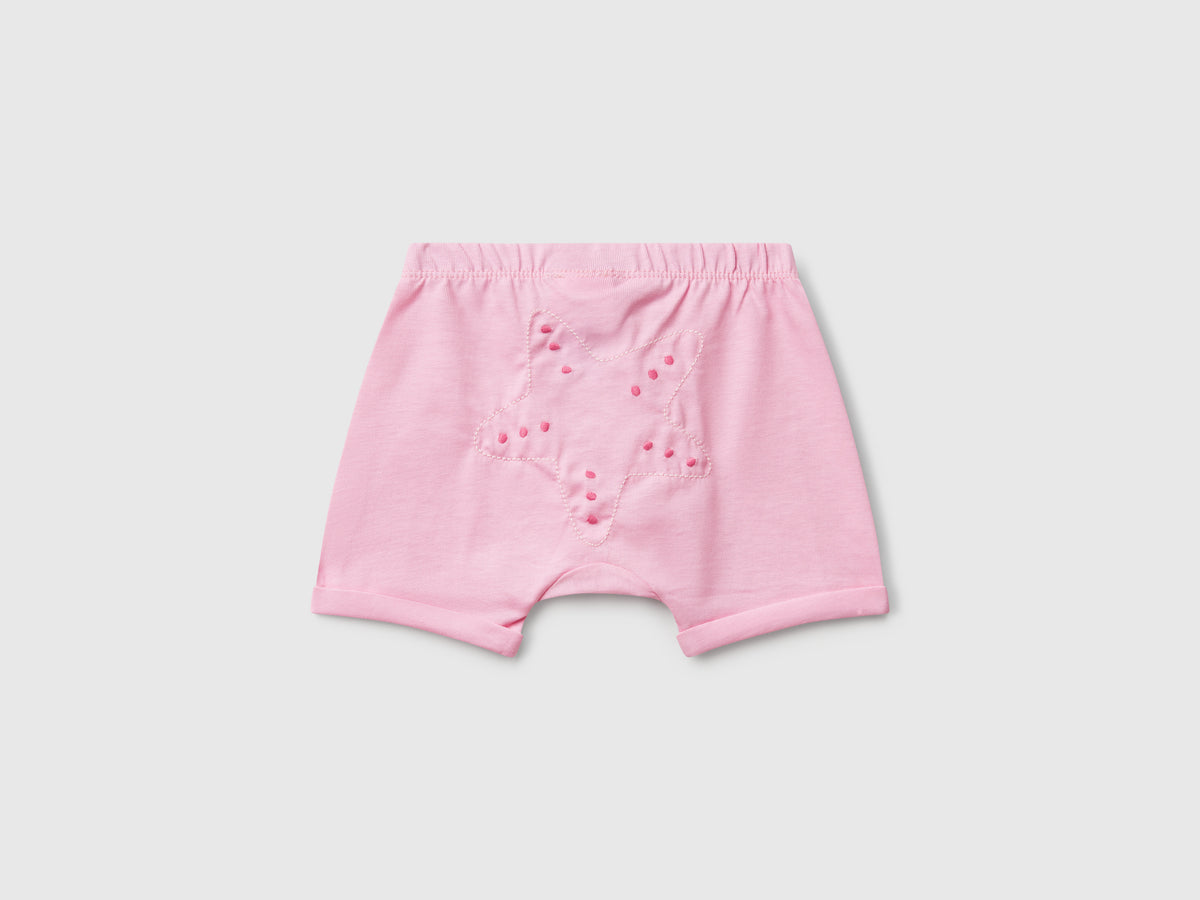 Shorts con patch sul retro
