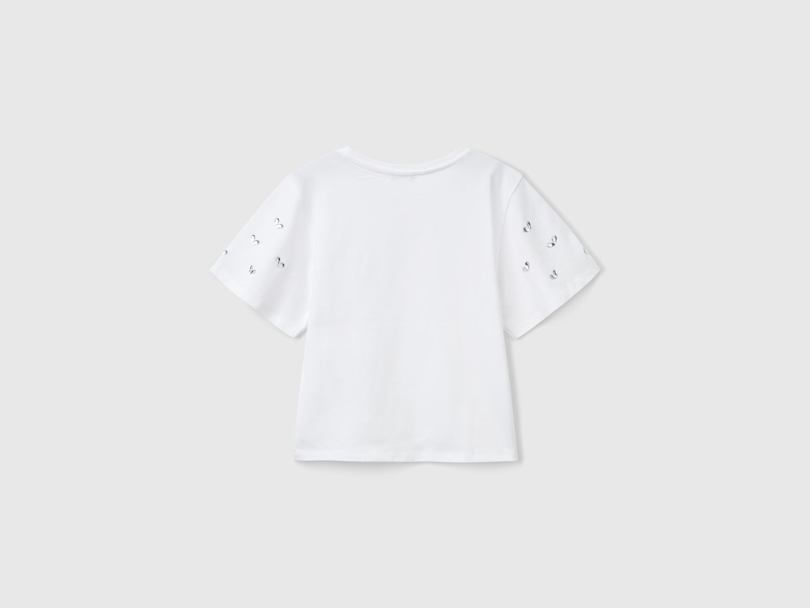 T-shirt con manica strass da bambina bianco 2 | Benetton Outlet