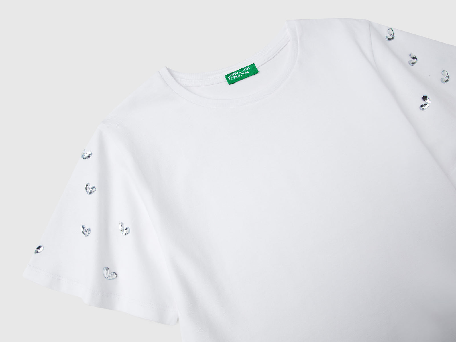 T-shirt con manica strass da bambina bianco 3 | Benetton Outlet
