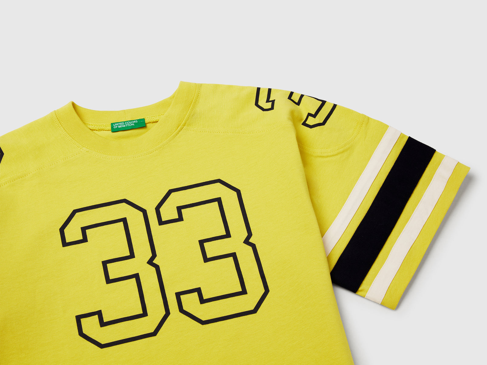 Maglietta manica corta con stampa da bambino giallo 3 | Benetton Outlet