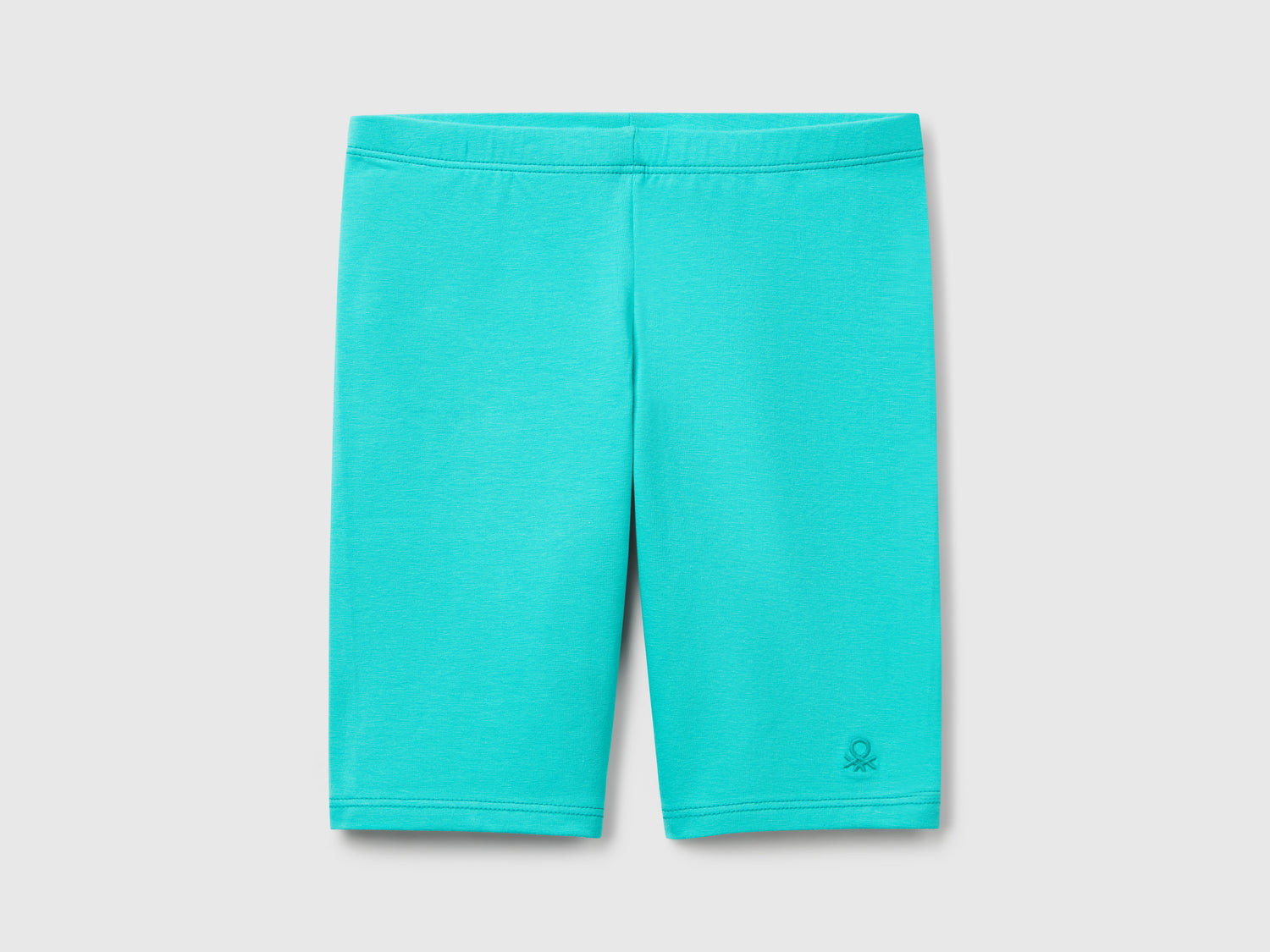Leggings corti in cotone stretch da bambina celeste fluo | Benetton Outlet
