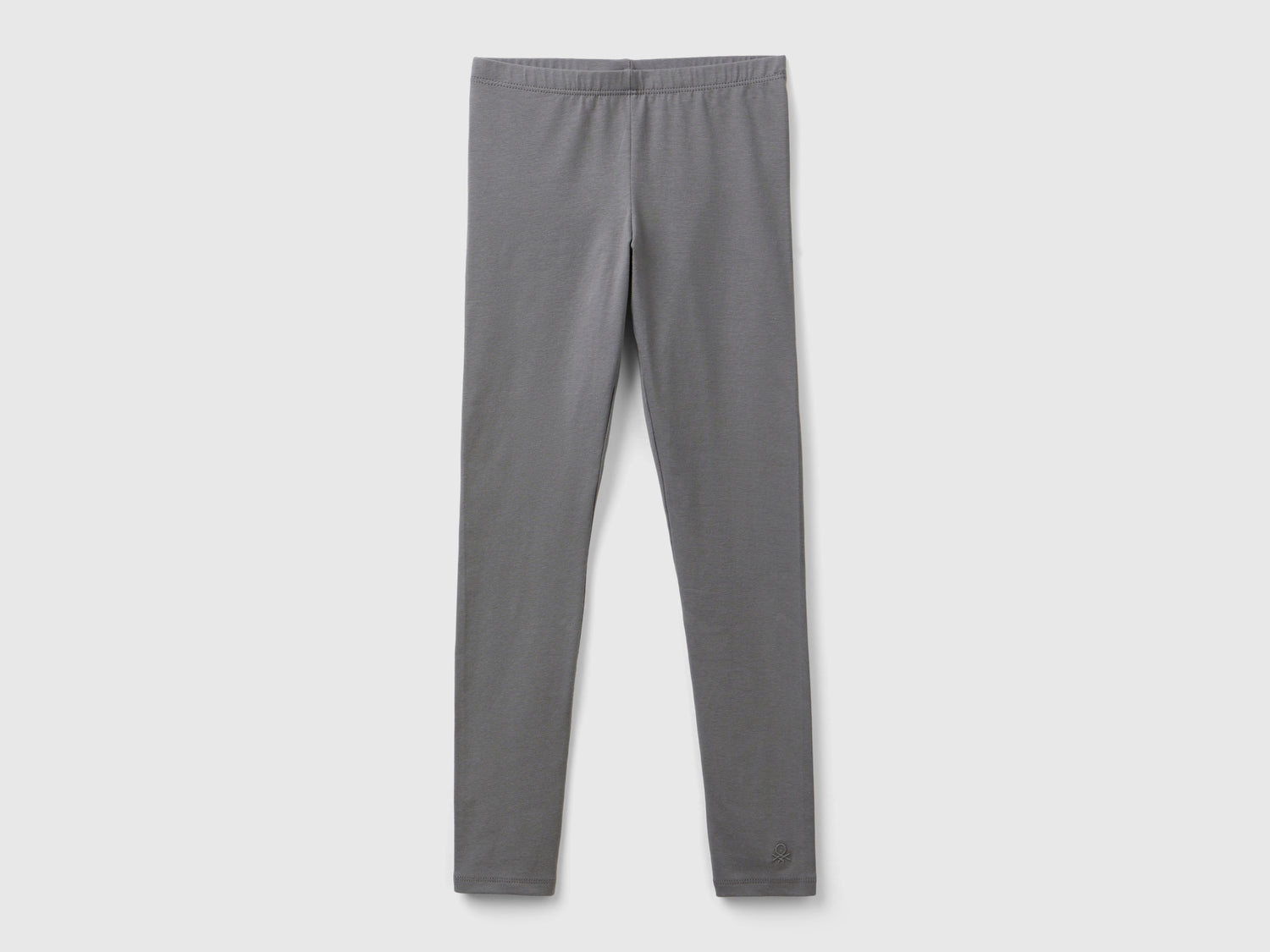 Leggings in cotone stretch con logo da bambina grigio scuro | Benetton Outlet