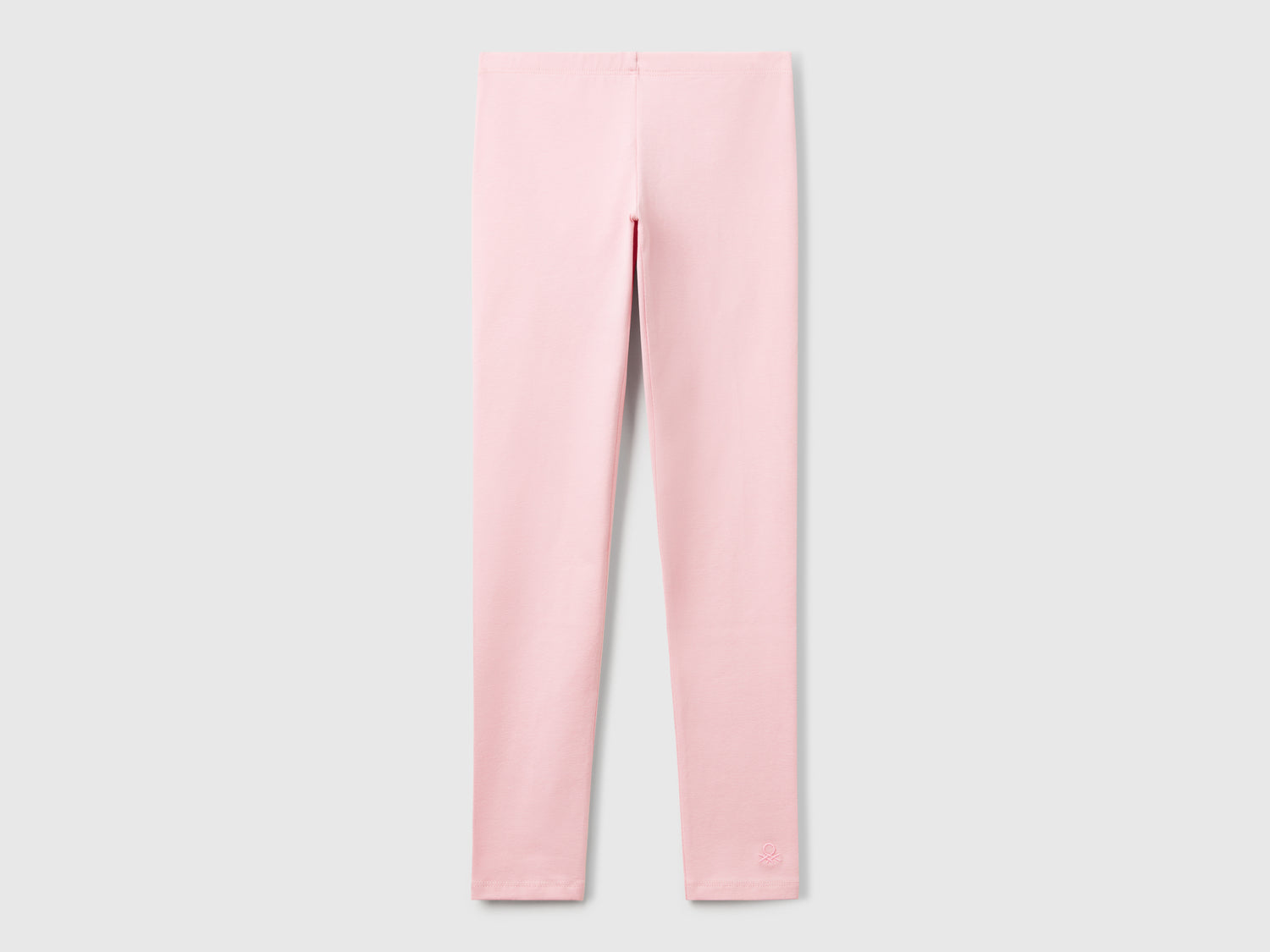 Leggings in cotone stretch con logo da bambina rosa | Benetton Outlet