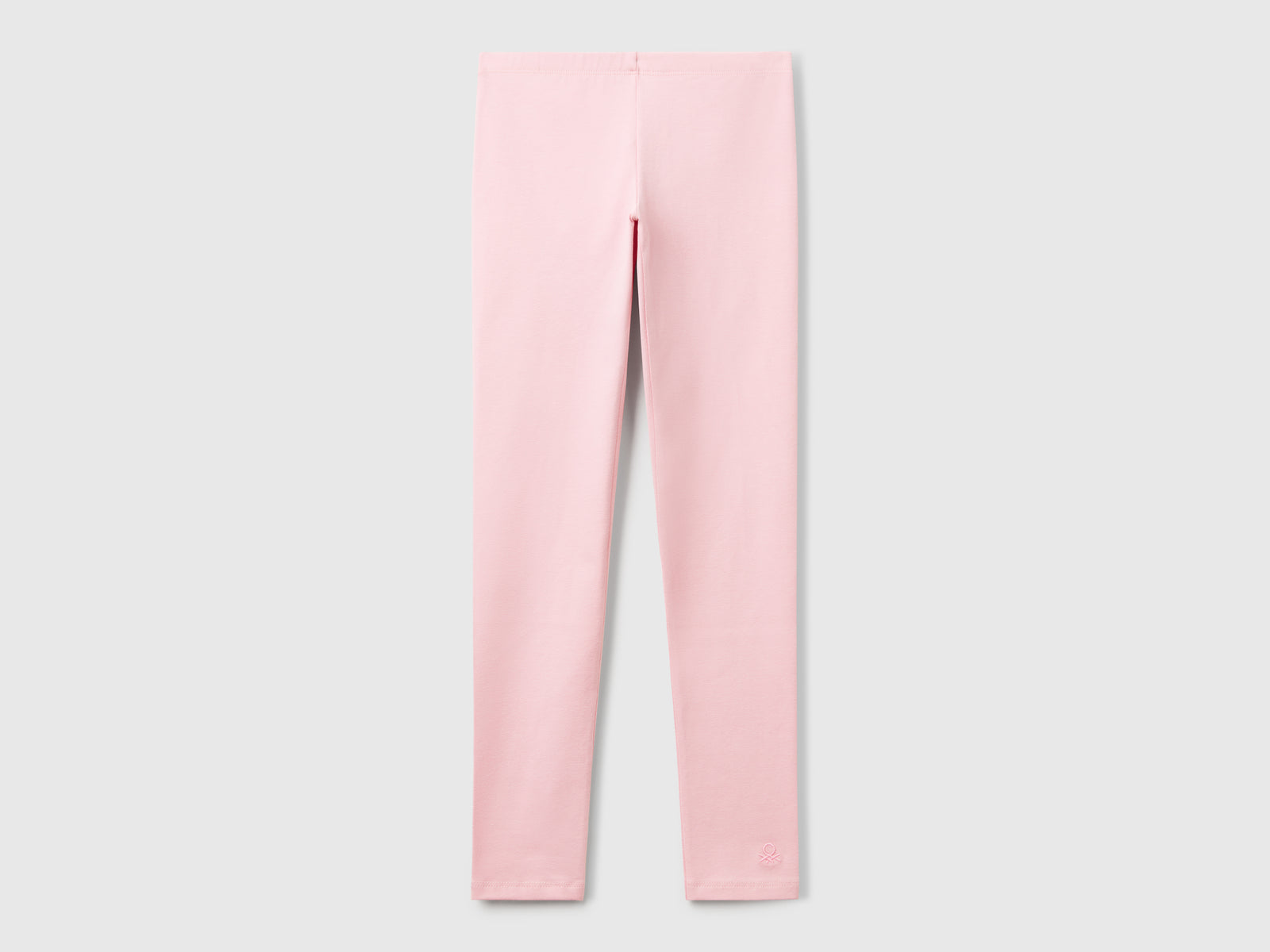 Leggings in cotone stretch con logo da bambina rosa | Benetton Outlet
