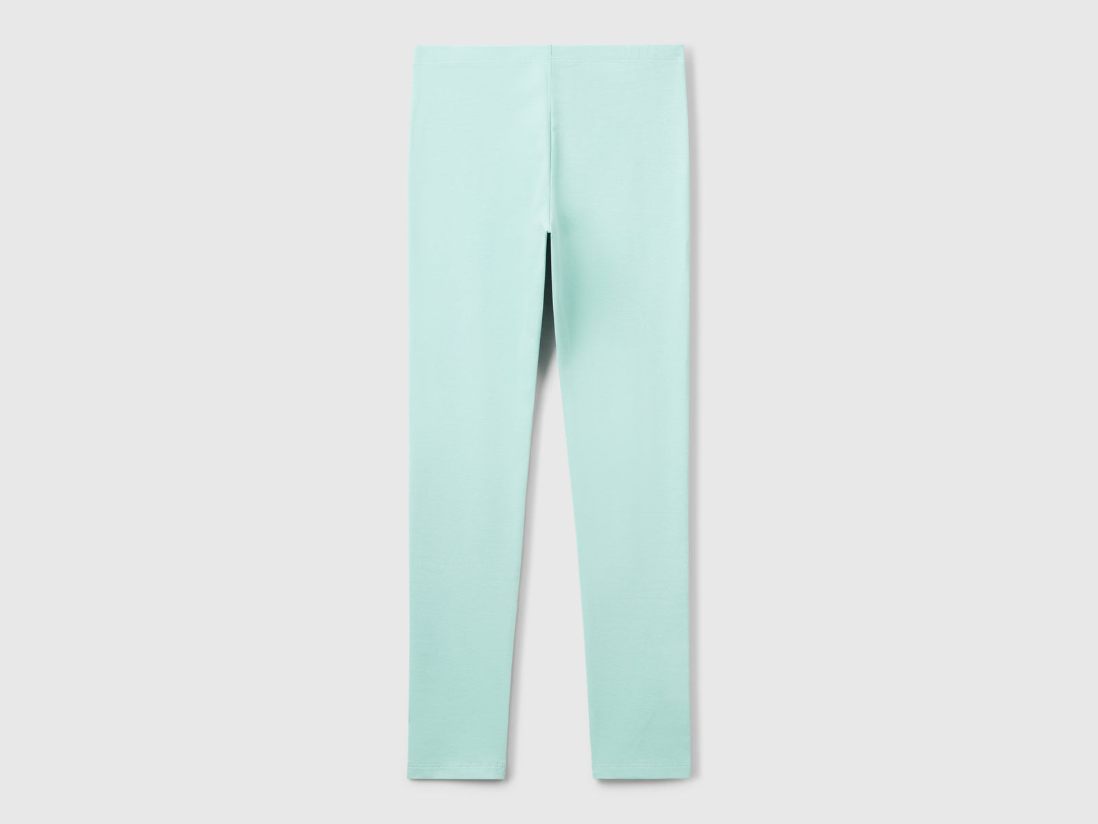 Leggings in cotone stretch con logo da bambina verde acqua 2 | Benetton Outlet