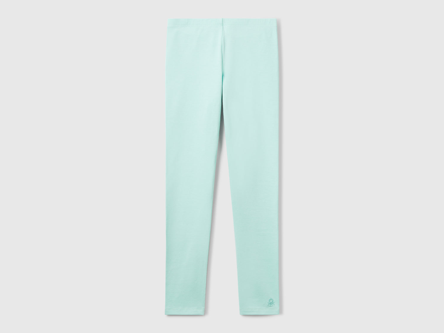 Leggings in cotone stretch con logo da bambina verde acqua | Benetton Outlet