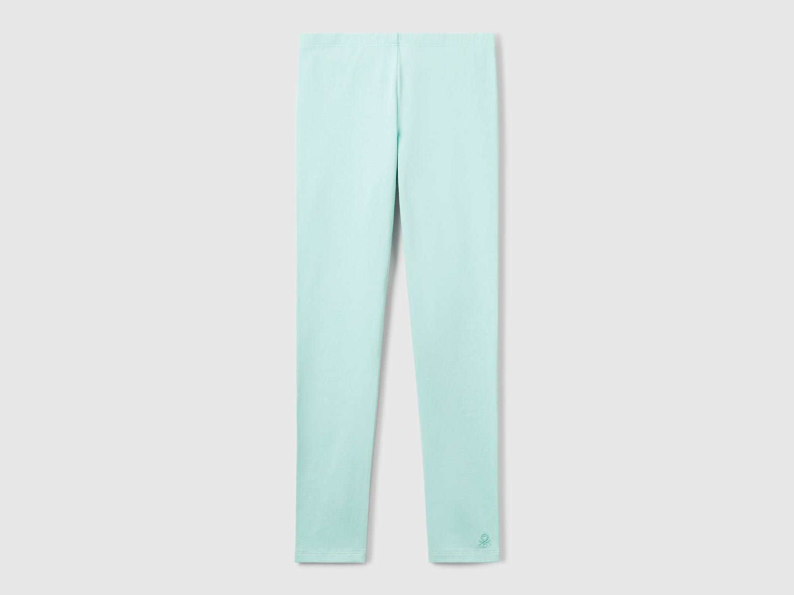 Leggings in cotone stretch con logo da bambina verde acqua | Benetton Outlet
