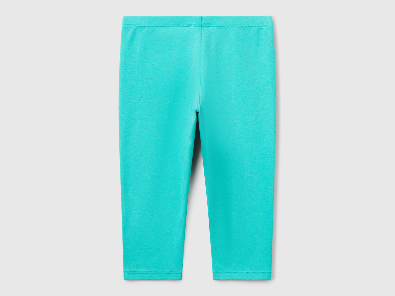 Leggings al ginocchio in cotone stretch da bambina celeste fluo 2 | Benetton Outlet