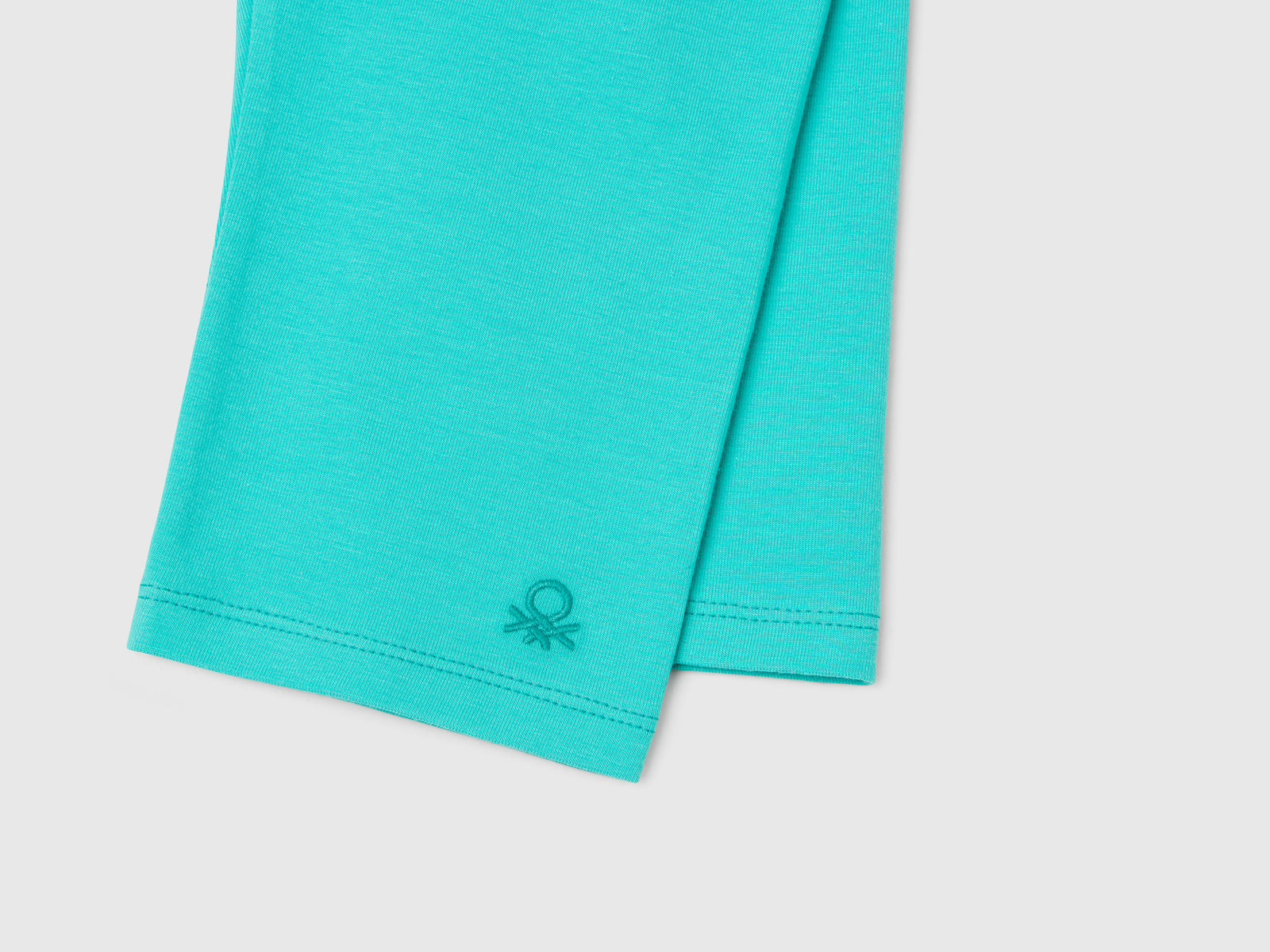 Leggings al ginocchio in cotone stretch da bambina celeste fluo 3 | Benetton Outlet
