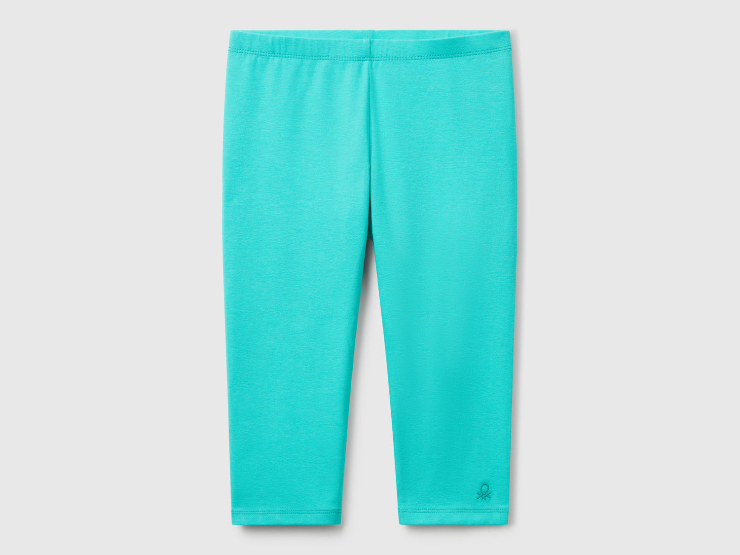Leggings al ginocchio in cotone stretch da bambina celeste fluo | Benetton Outlet