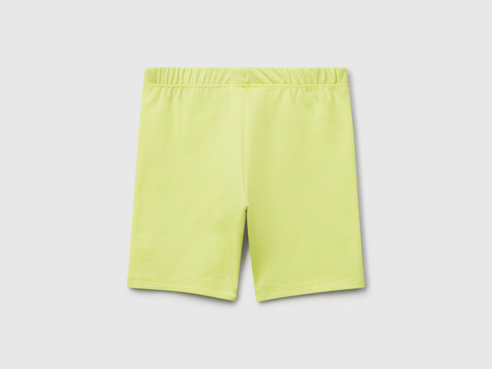 Leggings corti skinny fit da bimba giallo 2 | Benetton Outlet