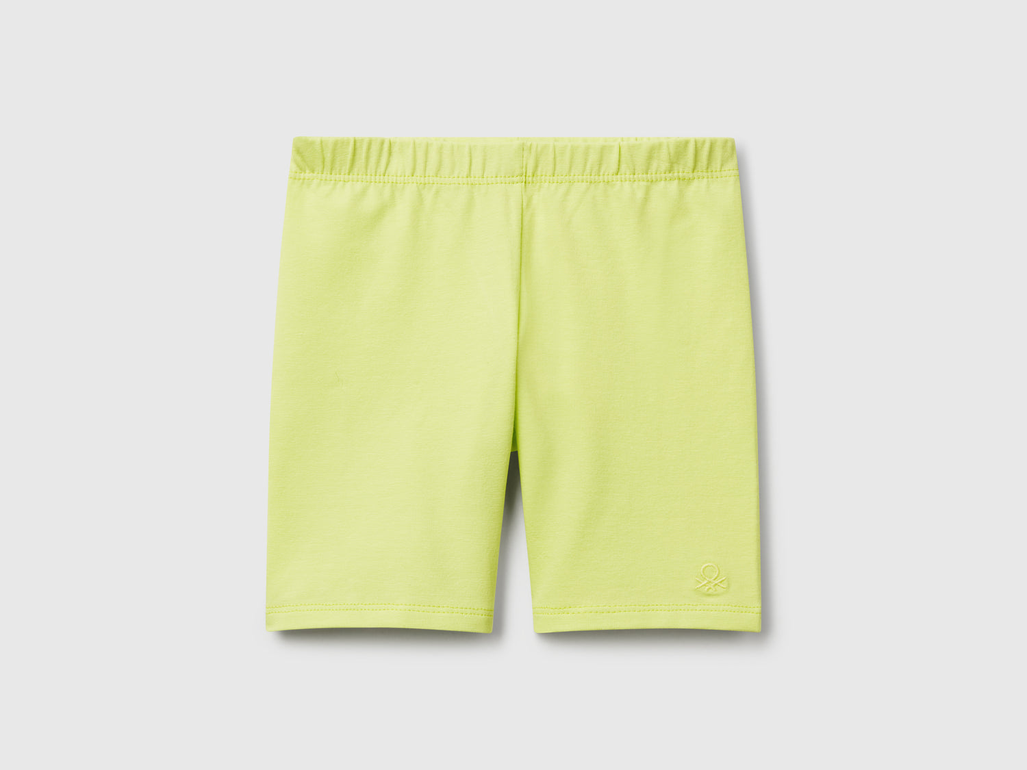 Leggings corti skinny fit da bimba giallo | Benetton Outlet