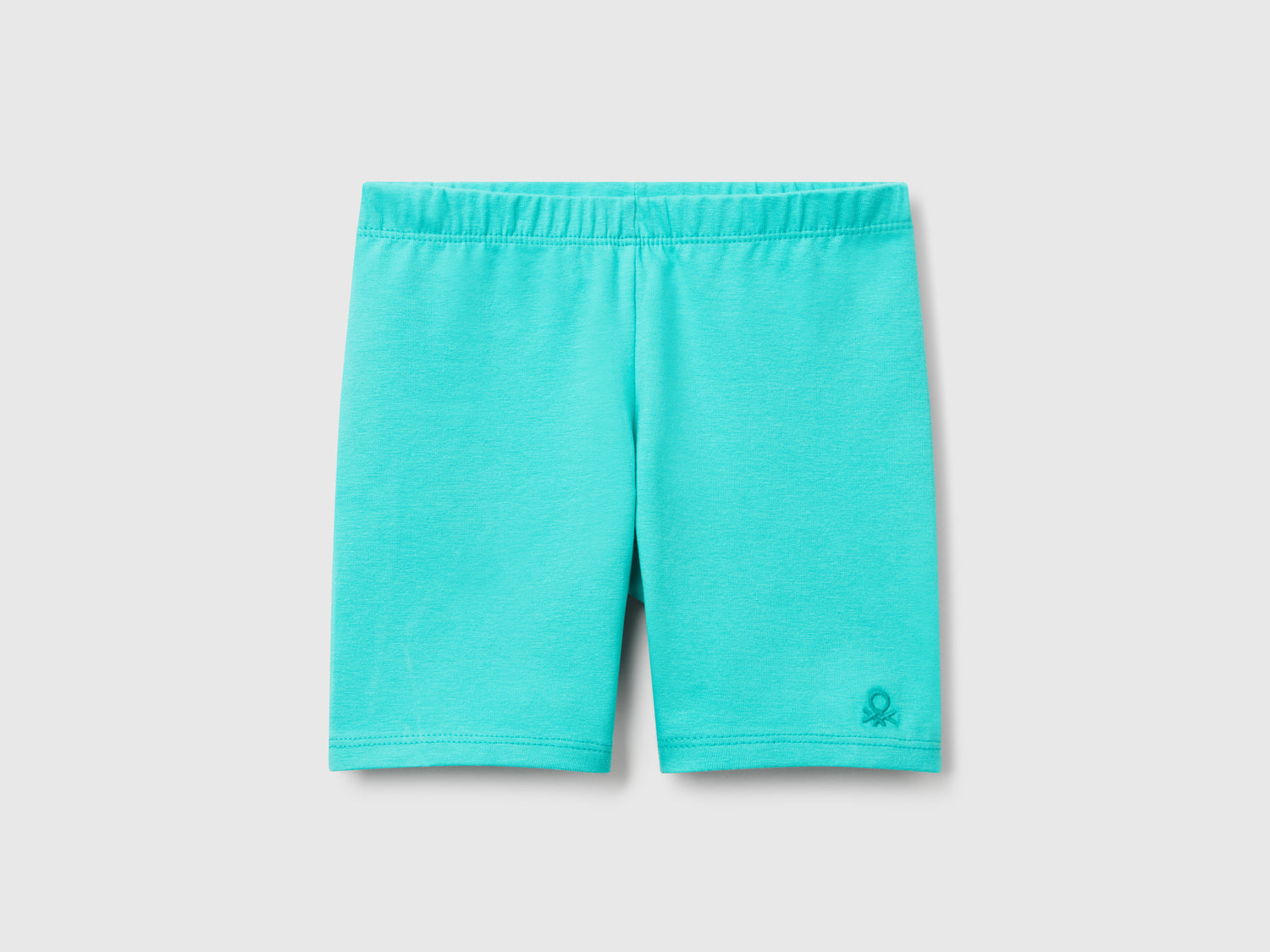 Leggings corti skinny fit da bimba celeste fluo | Benetton Outlet