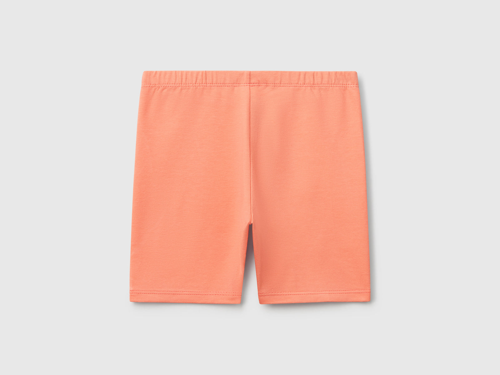 Leggings corti skinny fit da bimba pesca 2 | Benetton Outlet