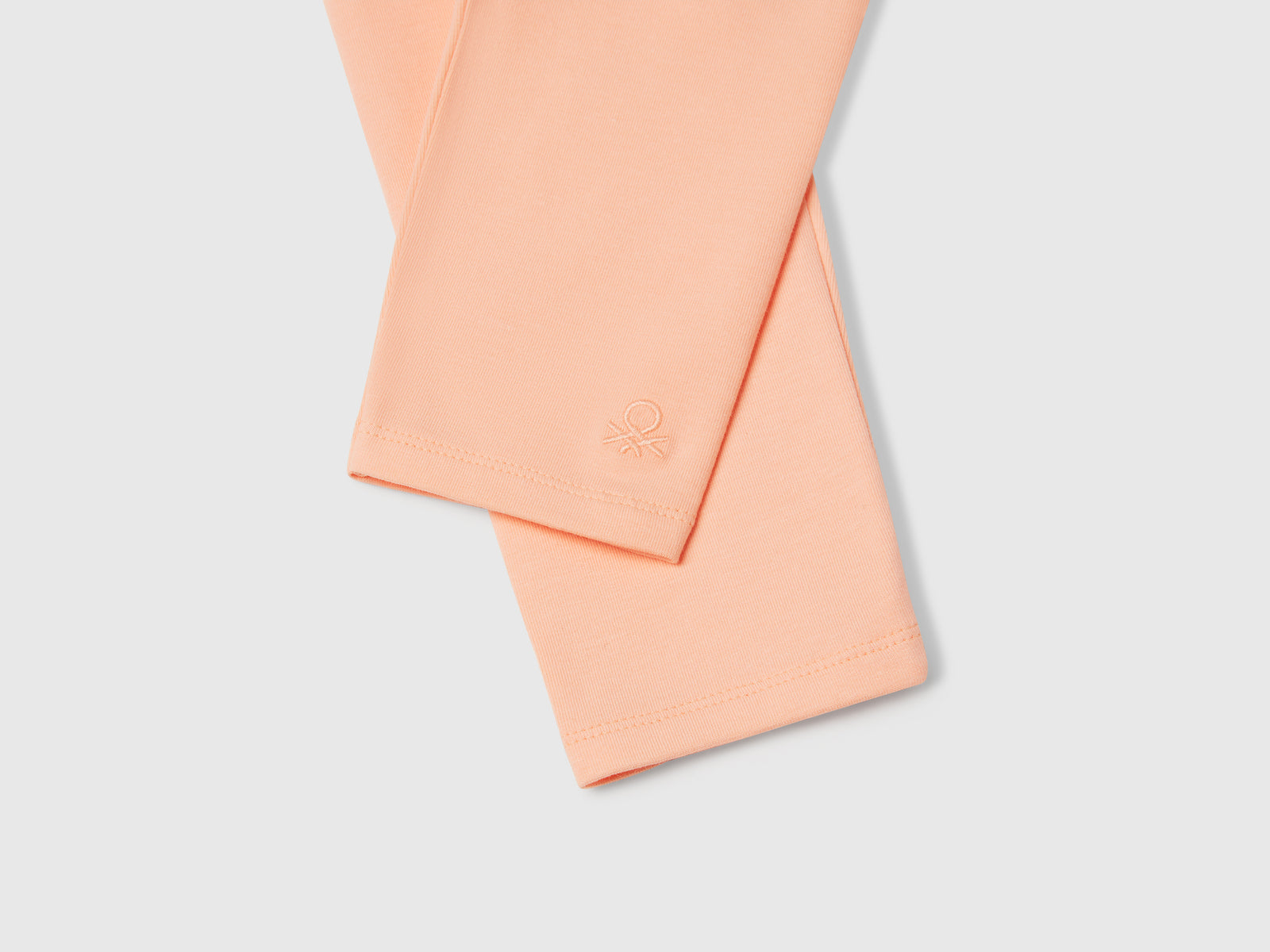 Leggings in cotone stretch da bimba pesca 3 | Benetton Outlet