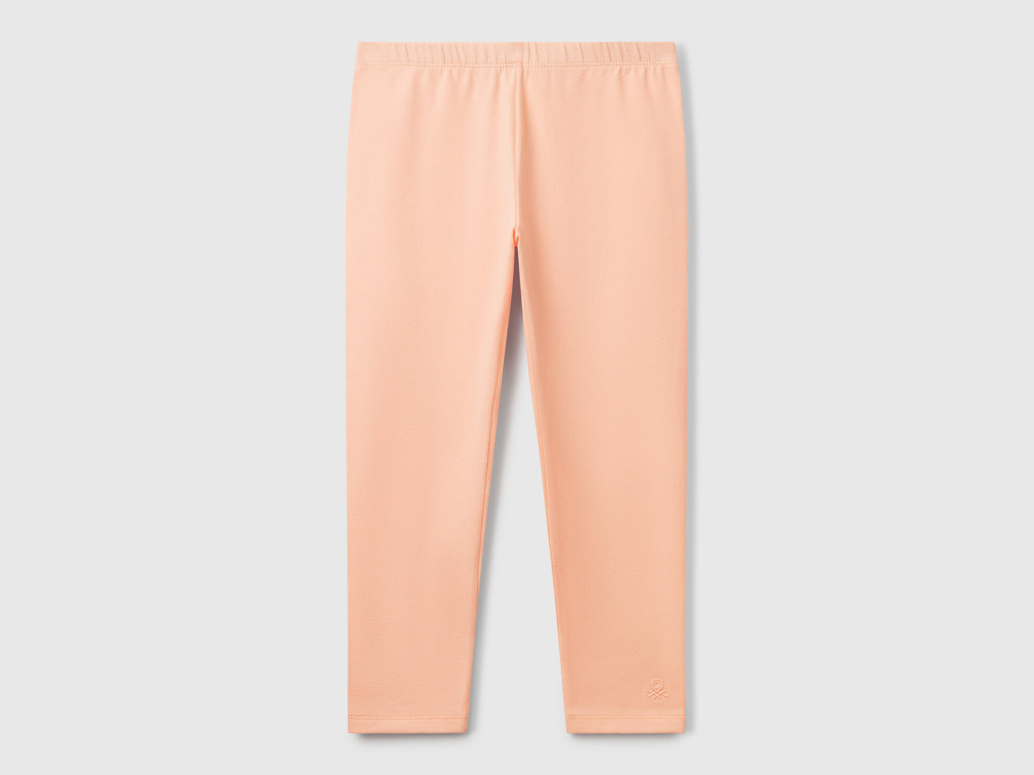 Leggings in cotone stretch da bimba pesca | Benetton Outlet