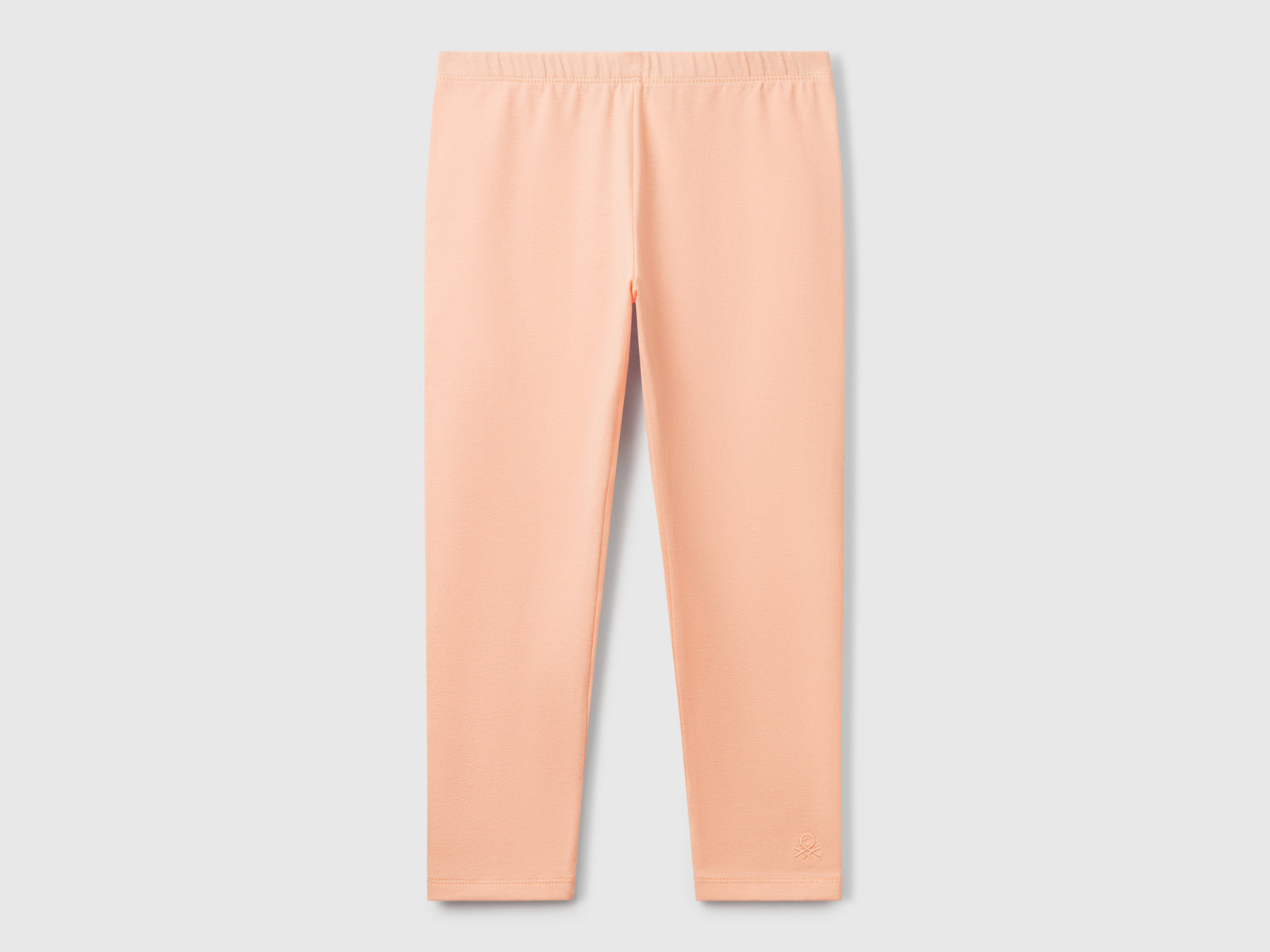 Leggings in cotone stretch da bimba pesca | Benetton Outlet