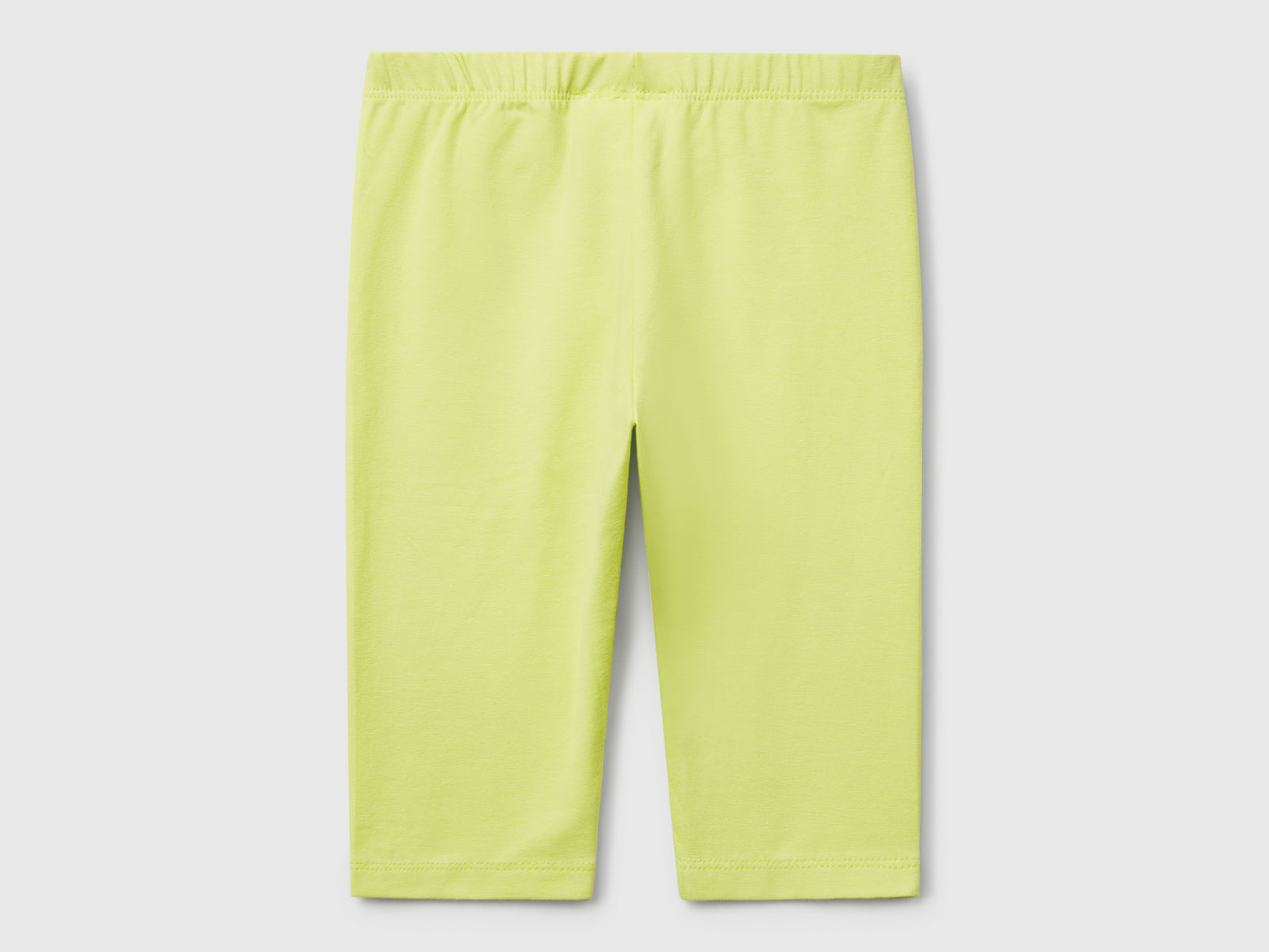 Leggings a 3/4 in cotone stretch da bimba giallo 2 | Benetton Outlet