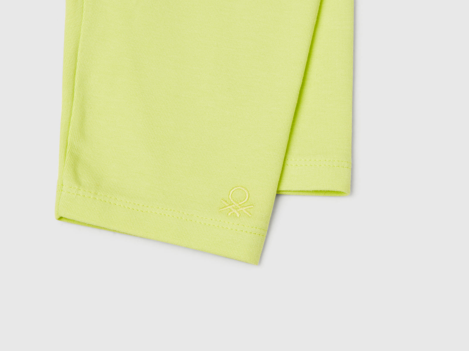 Leggings a 3/4 in cotone stretch da bimba giallo 3 | Benetton Outlet