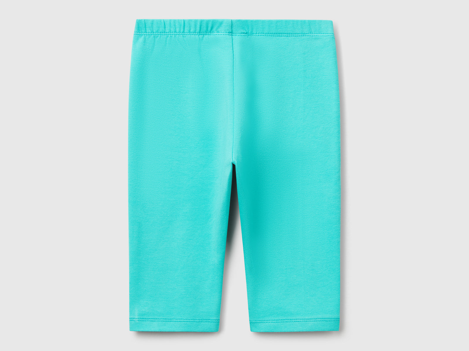 Leggings a 3/4 in cotone stretch da bimba celeste fluo 2 | Benetton Outlet