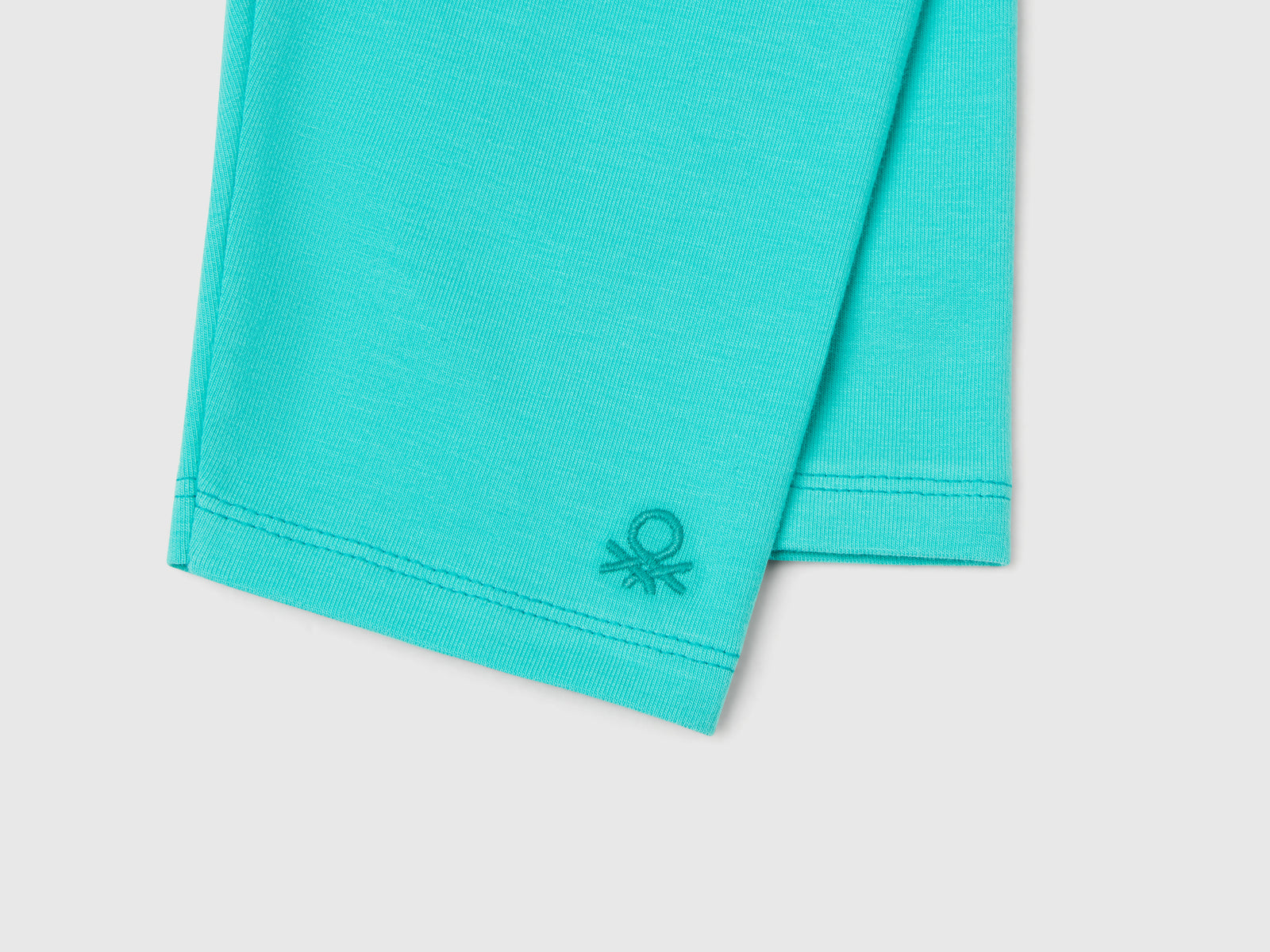 Leggings a 3/4 in cotone stretch da bimba celeste fluo 3 | Benetton Outlet