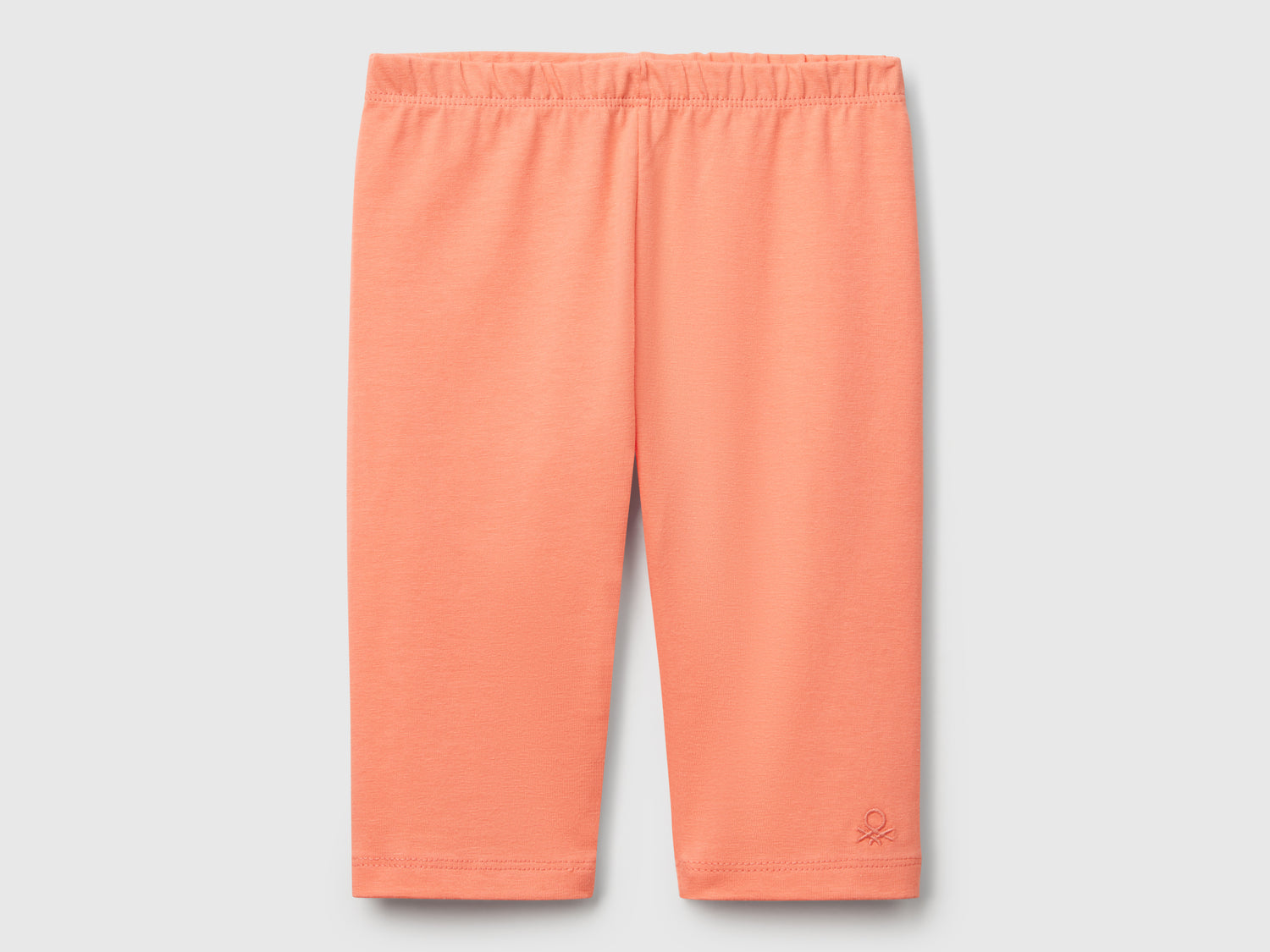 Leggings a 3/4 in cotone stretch da bimba pesca | Benetton Outlet