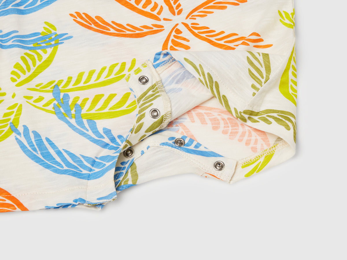 Tutina con stampa tropicale