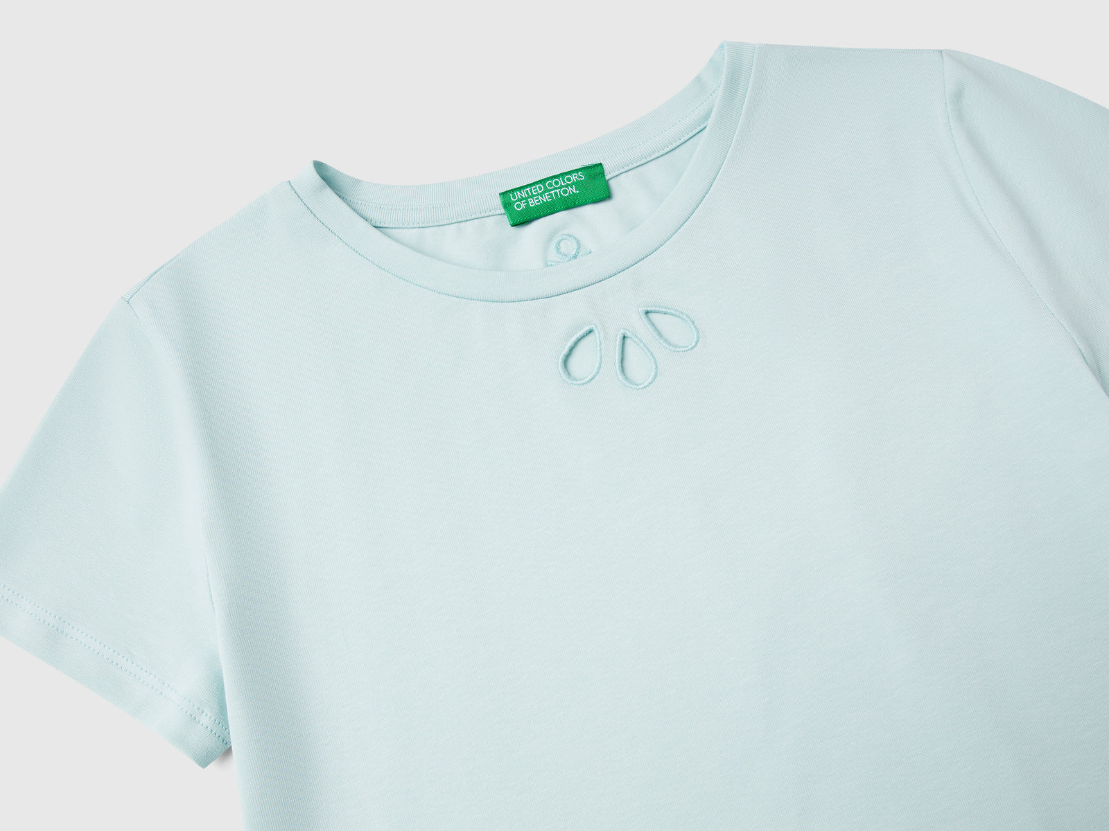 Maglietta con motivo cut out da bambina verde acqua 3 | Benetton Outlet