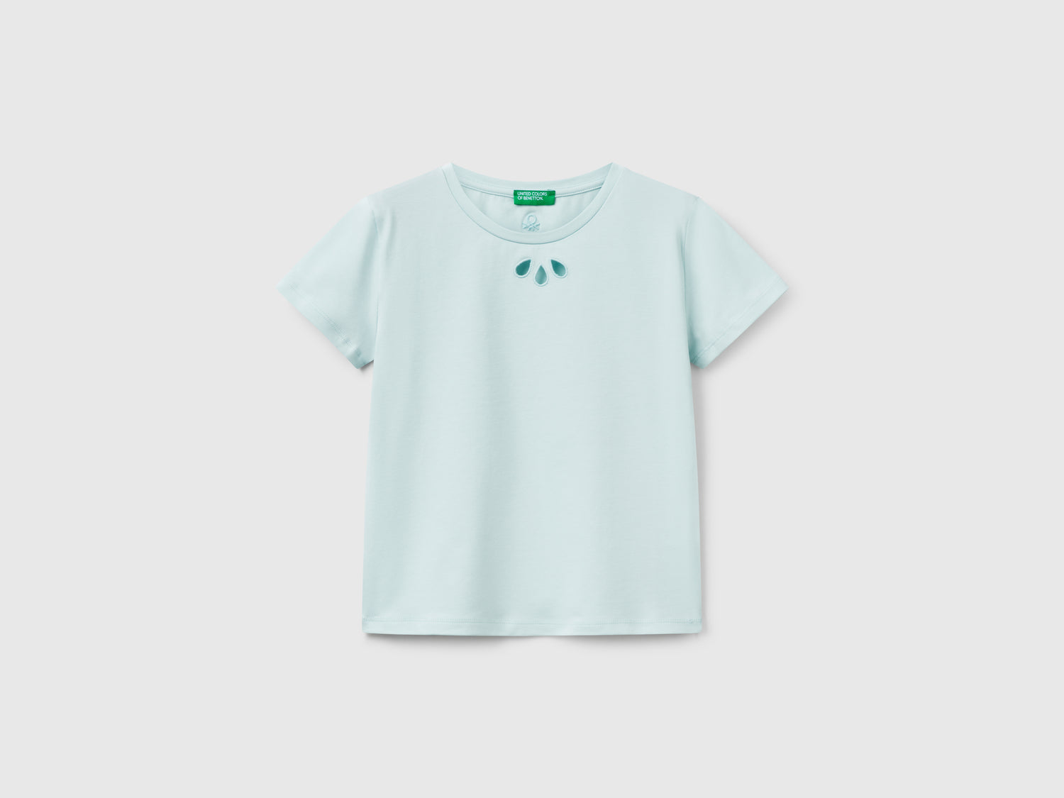 Maglietta con motivo cut out da bambina verde acqua | Benetton Outlet