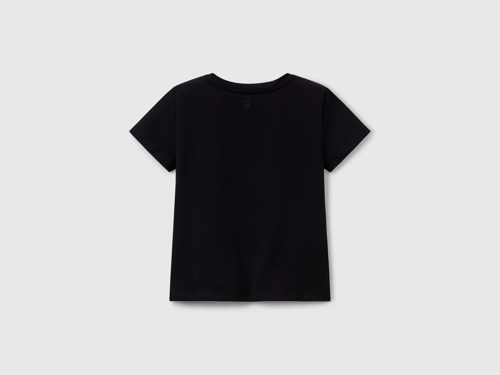 Maglietta con motivo cut out da bambina nero 2 | Benetton Outlet