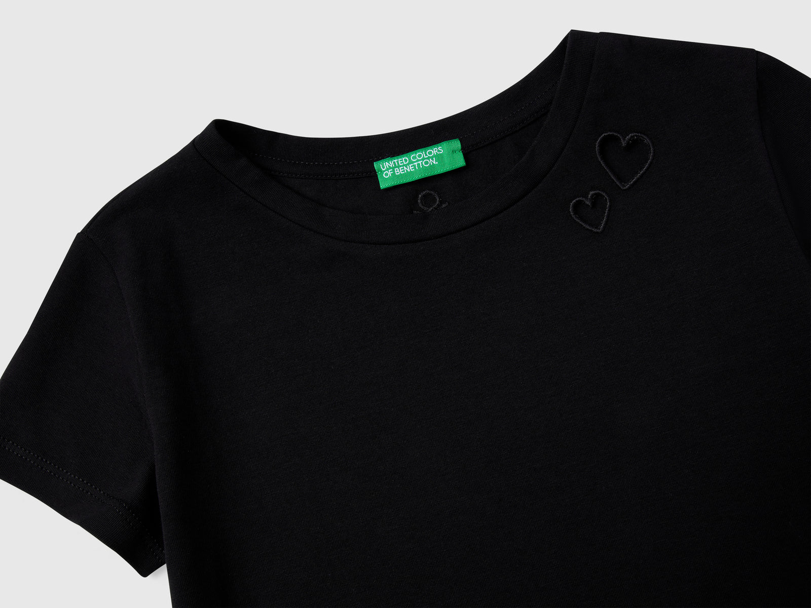 Maglietta con motivo cut out da bambina nero 3 | Benetton Outlet