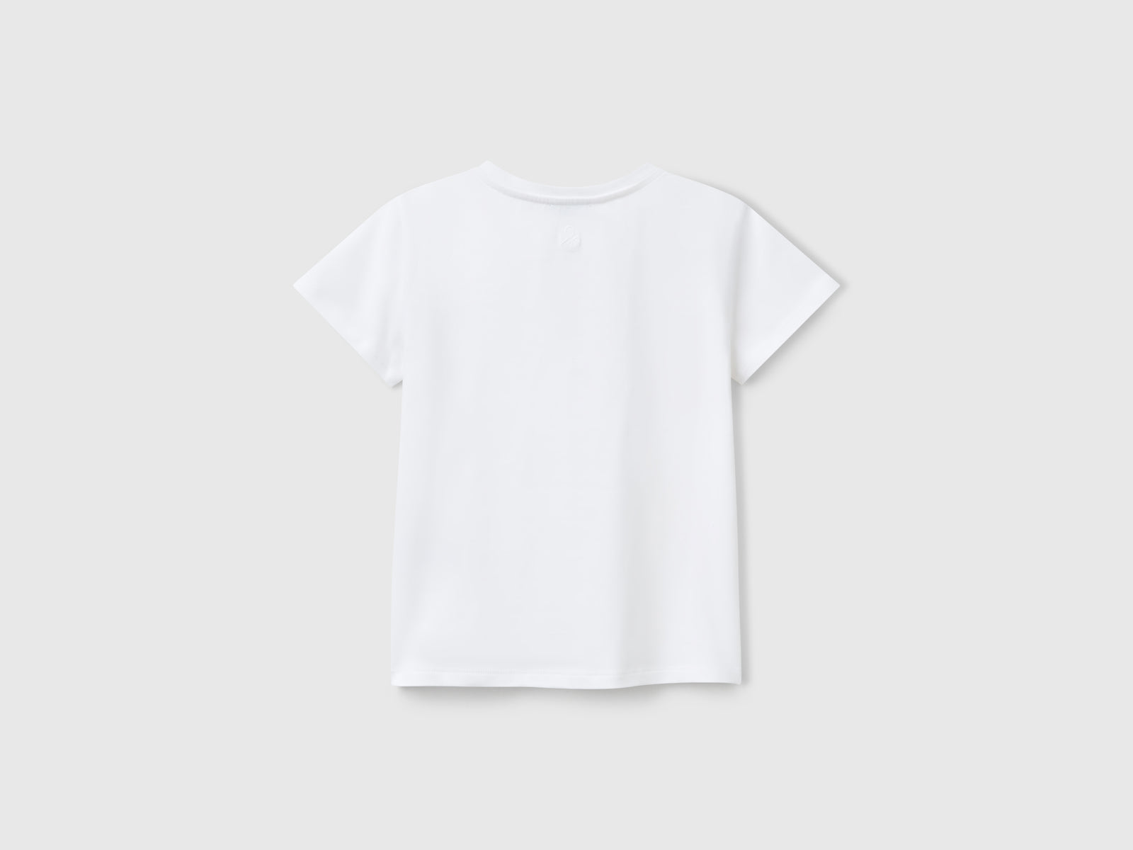 Maglietta con motivo cut out da bambina bianco 2 | Benetton Outlet