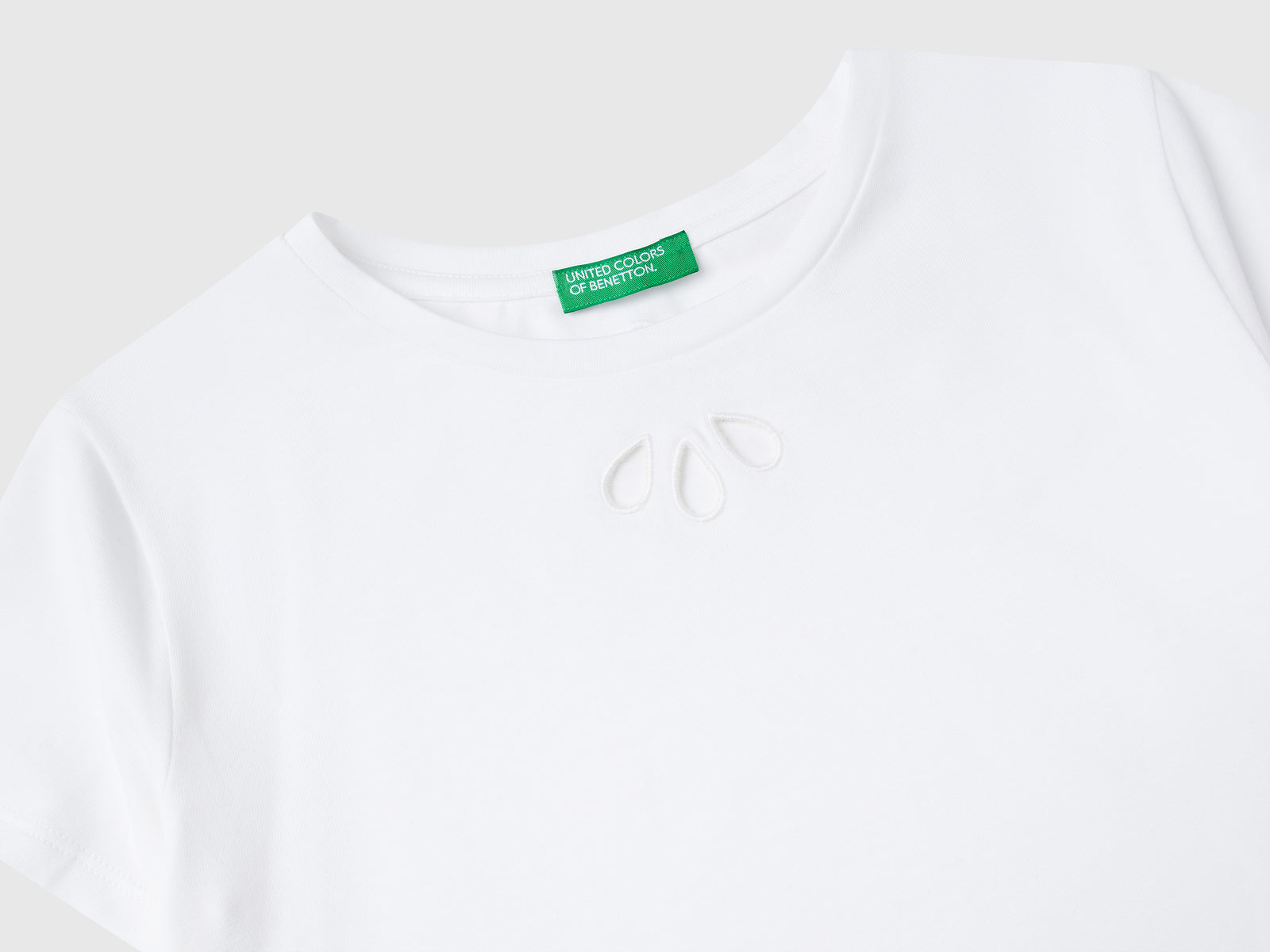 Maglietta con motivo cut out da bambina bianco 3 | Benetton Outlet