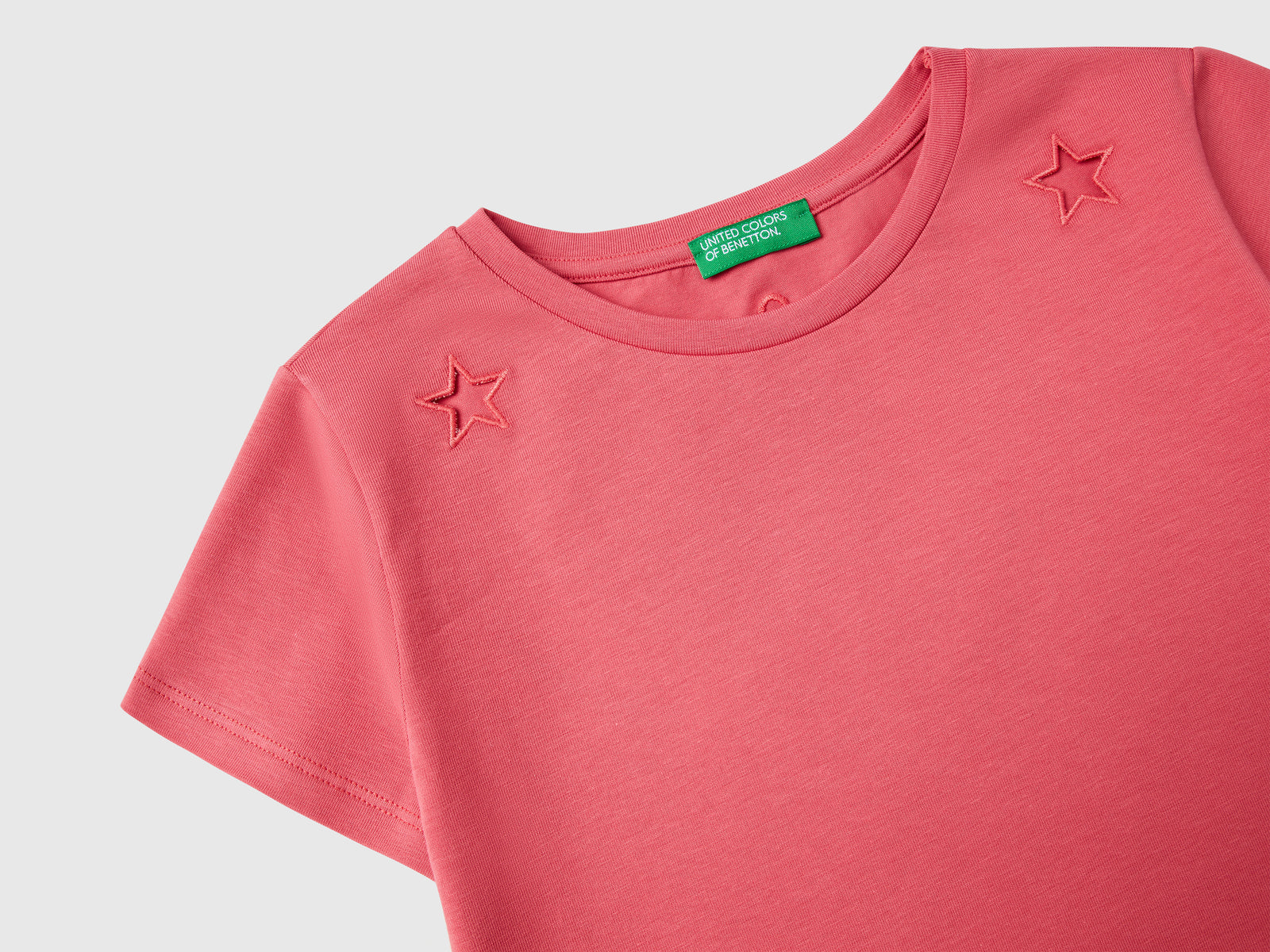 Maglietta con motivo cut out da bambina ciclamino 3 | Benetton Outlet