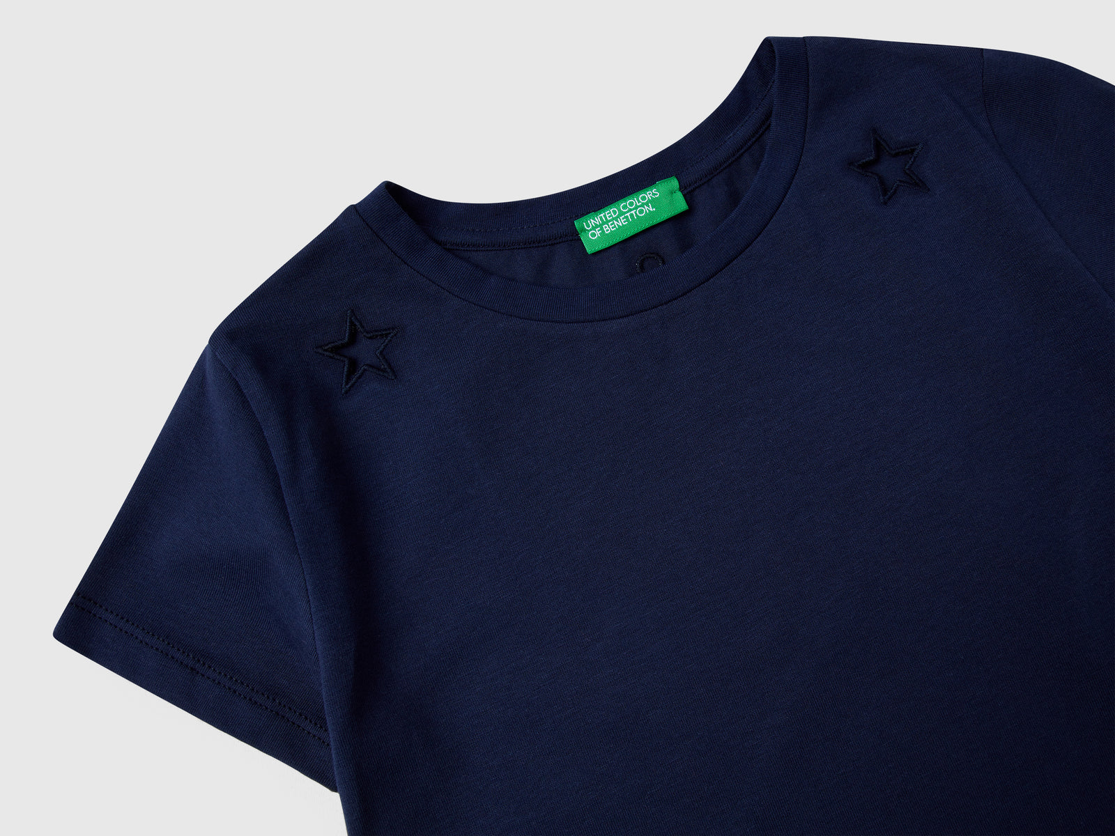 Maglietta con motivo cut out da bambina blu scuro 3 | Benetton Outlet