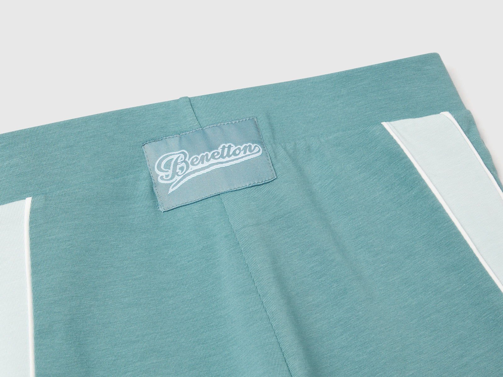 Leggings sportivi con piping da bambina verde acqua 3 | Benetton Outlet