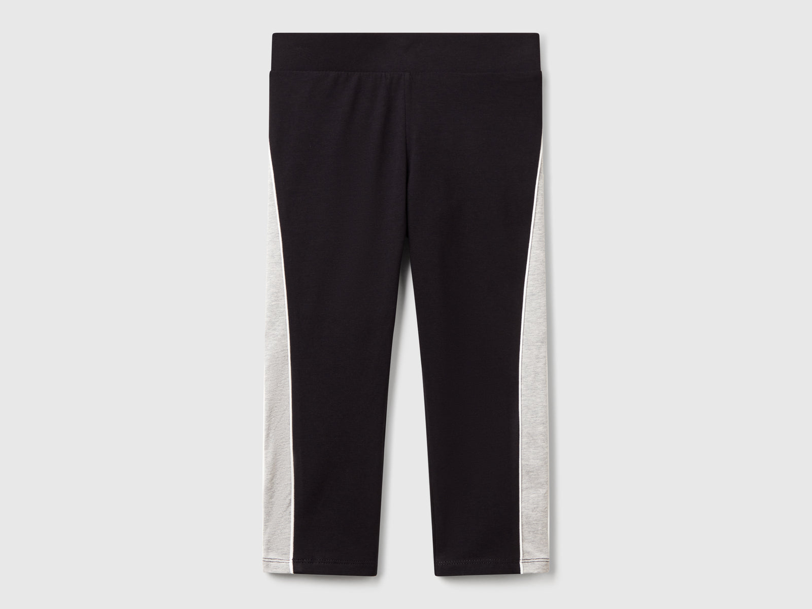 Leggings sportivi con piping da bambina nero | Benetton Outlet