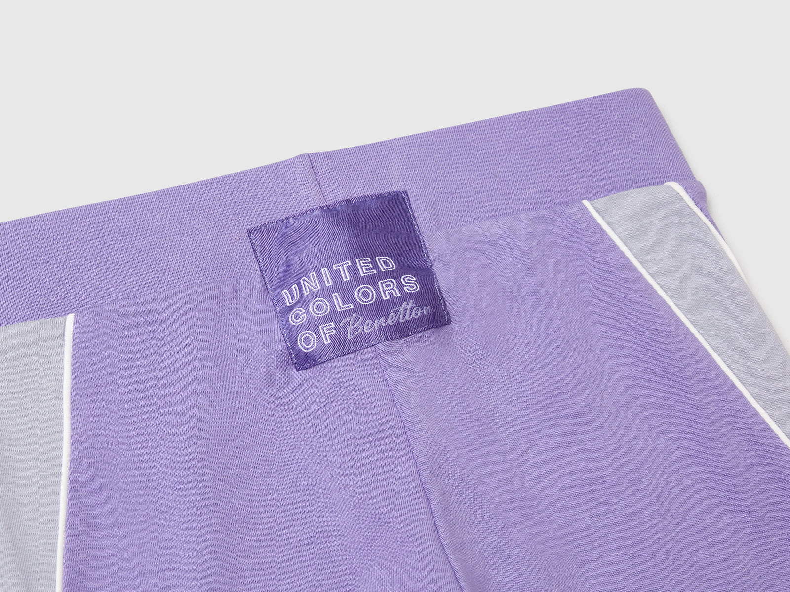 Leggings sportivi con piping da bambina pervinca 3 | Benetton Outlet
