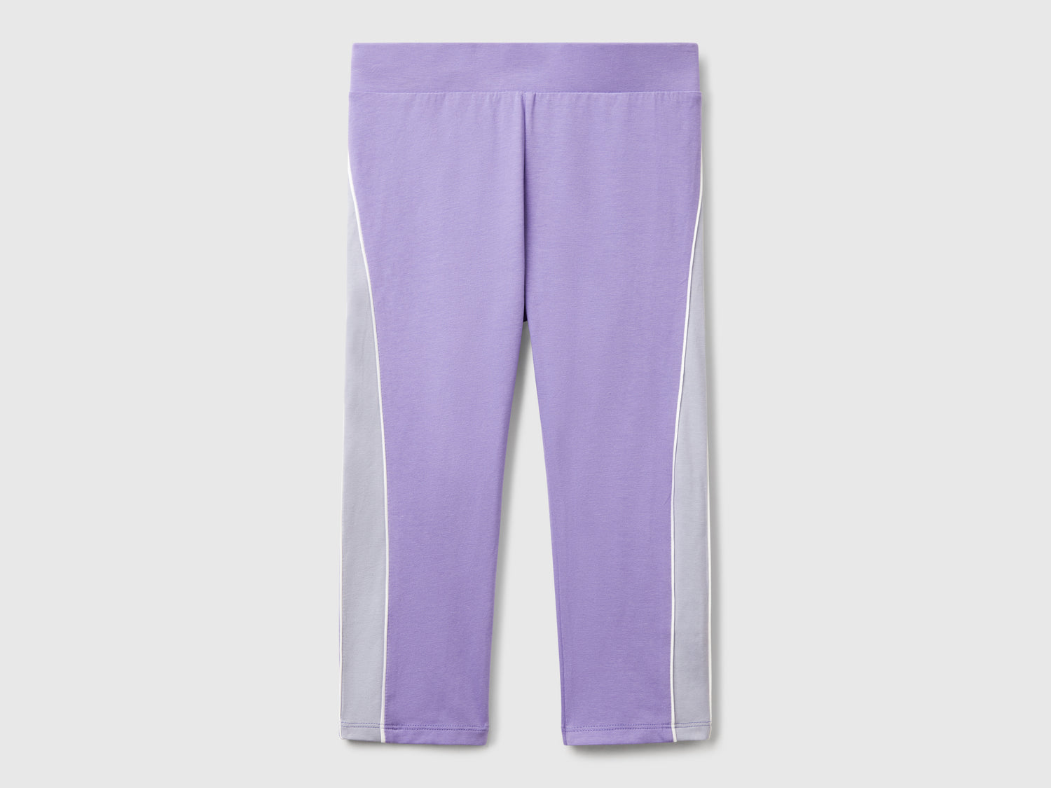 Leggings sportivi con piping da bambina pervinca | Benetton Outlet