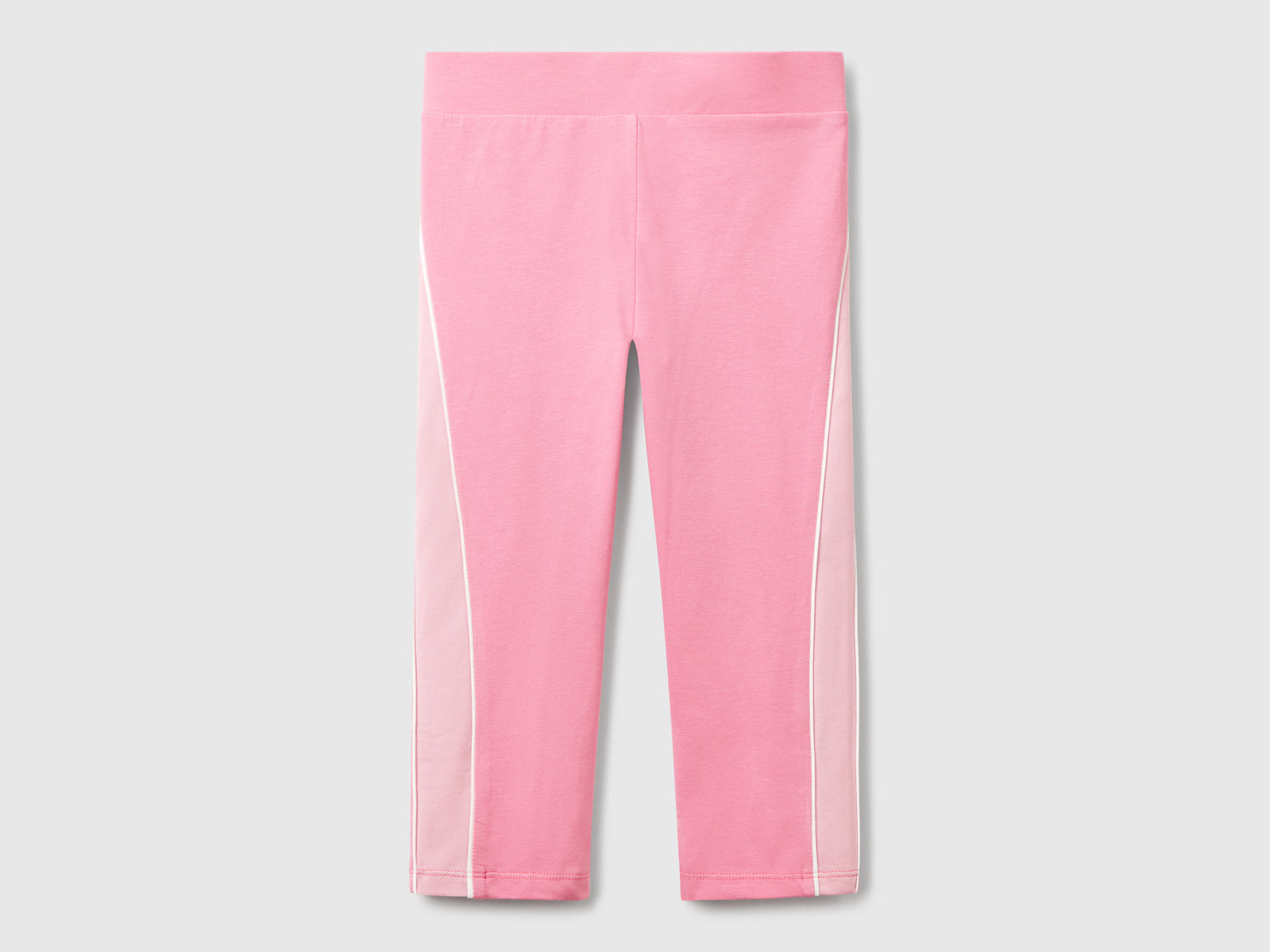 Leggings sportivi con piping da bambina rosa | Benetton Outlet