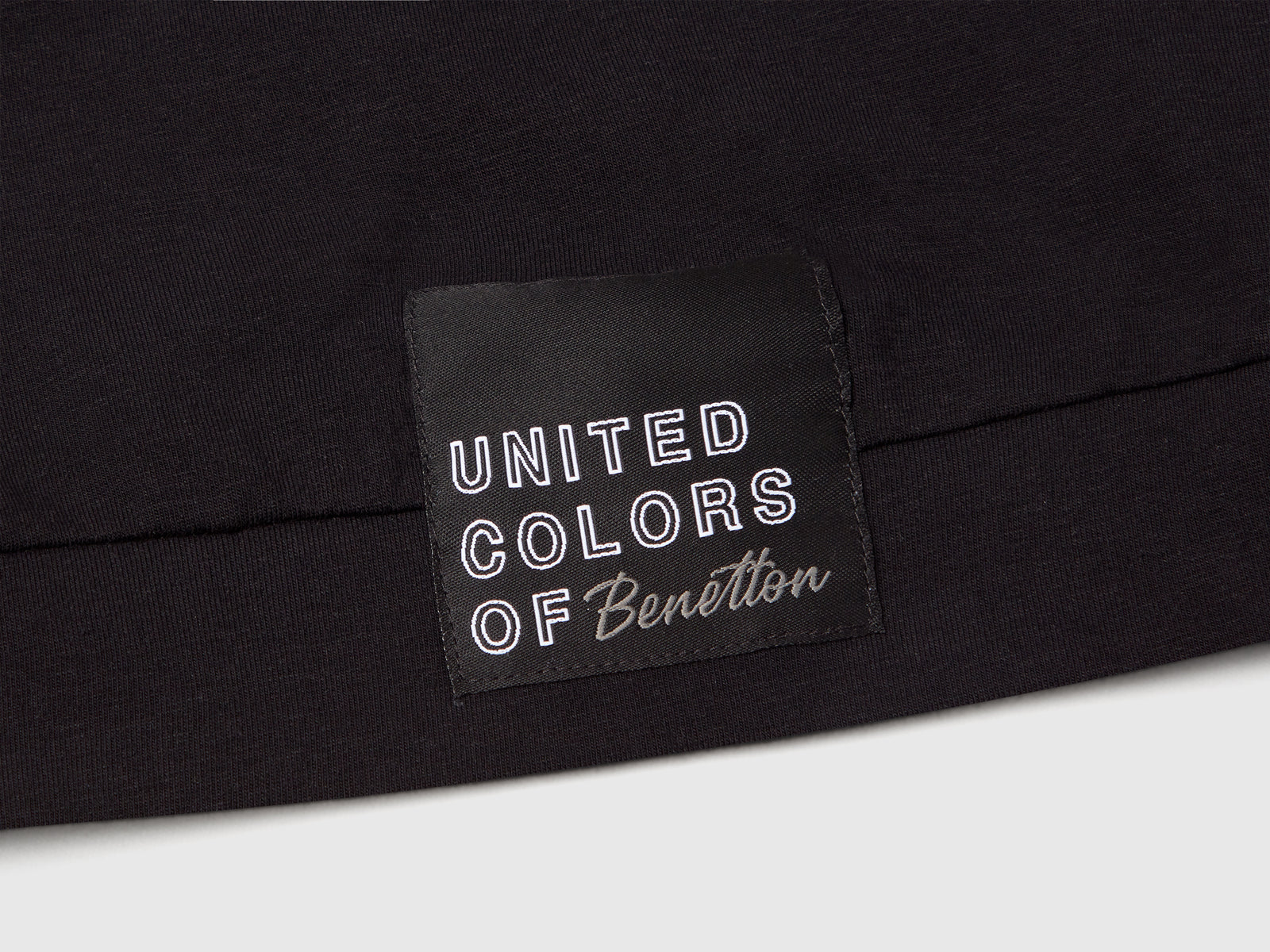 Top sportivo con piping da bambina nero 3 | Benetton Outlet