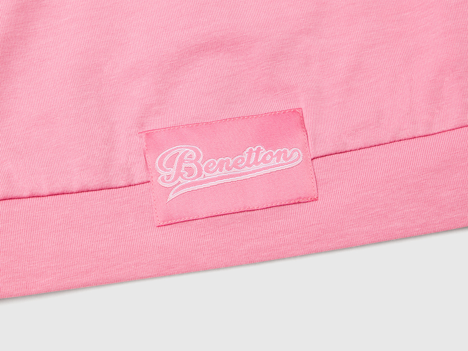 Top sportivo con piping da bambina rosa 3 | Benetton Outlet