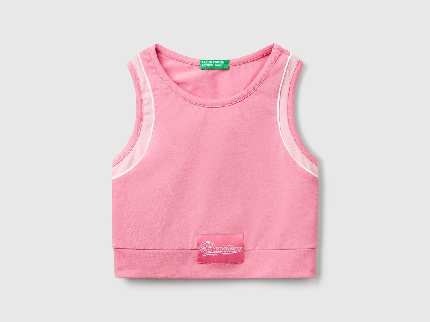 Top sportivo con piping da bambina rosa | Benetton Outlet