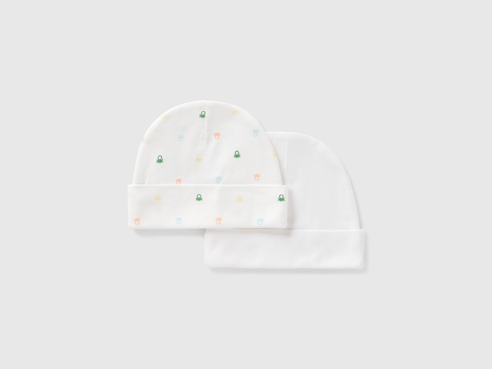 Due cappellini in cotone da neonato bianco 2 | Benetton Outlet