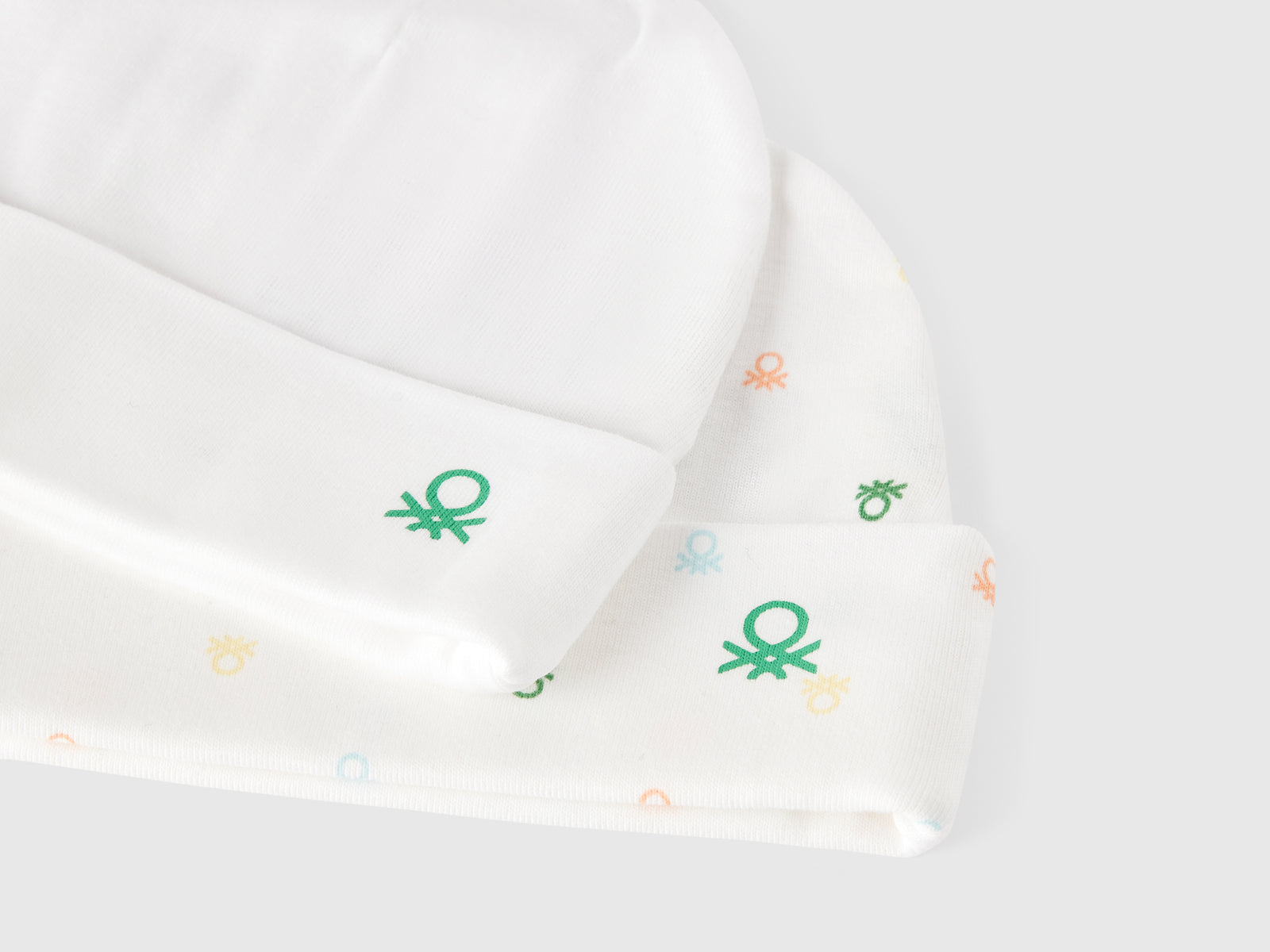Due cappellini in cotone da neonato bianco 3 | Benetton Outlet