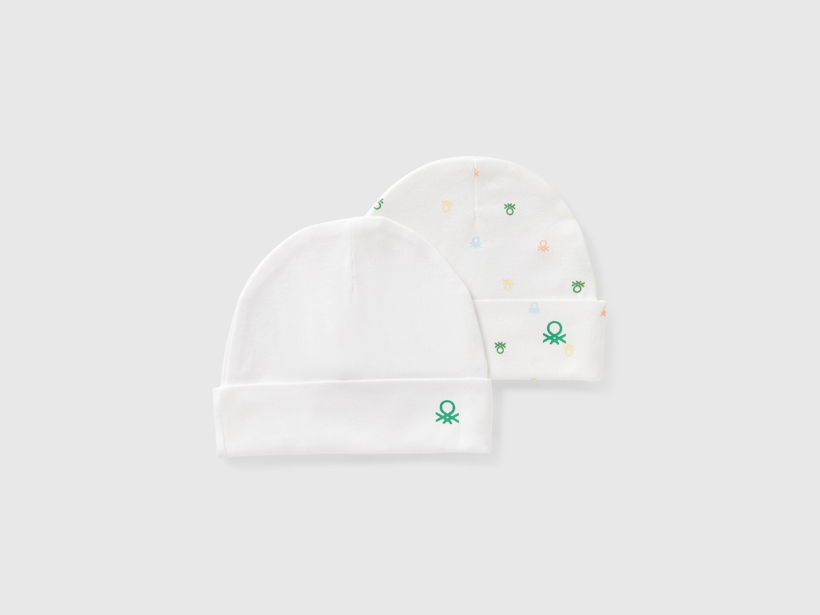 Due cappellini in cotone da neonato bianco | Benetton Outlet