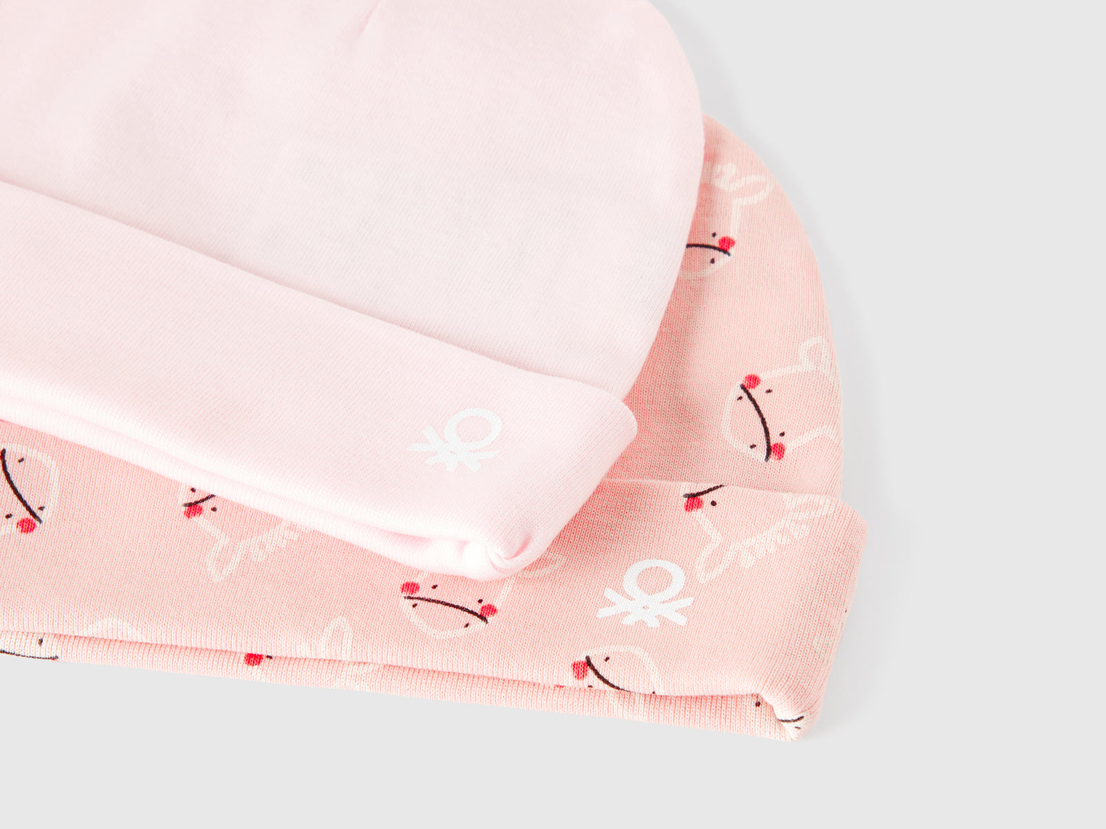 Due cappellini in cotone da neonato rosa tenue 3 | Benetton Outlet