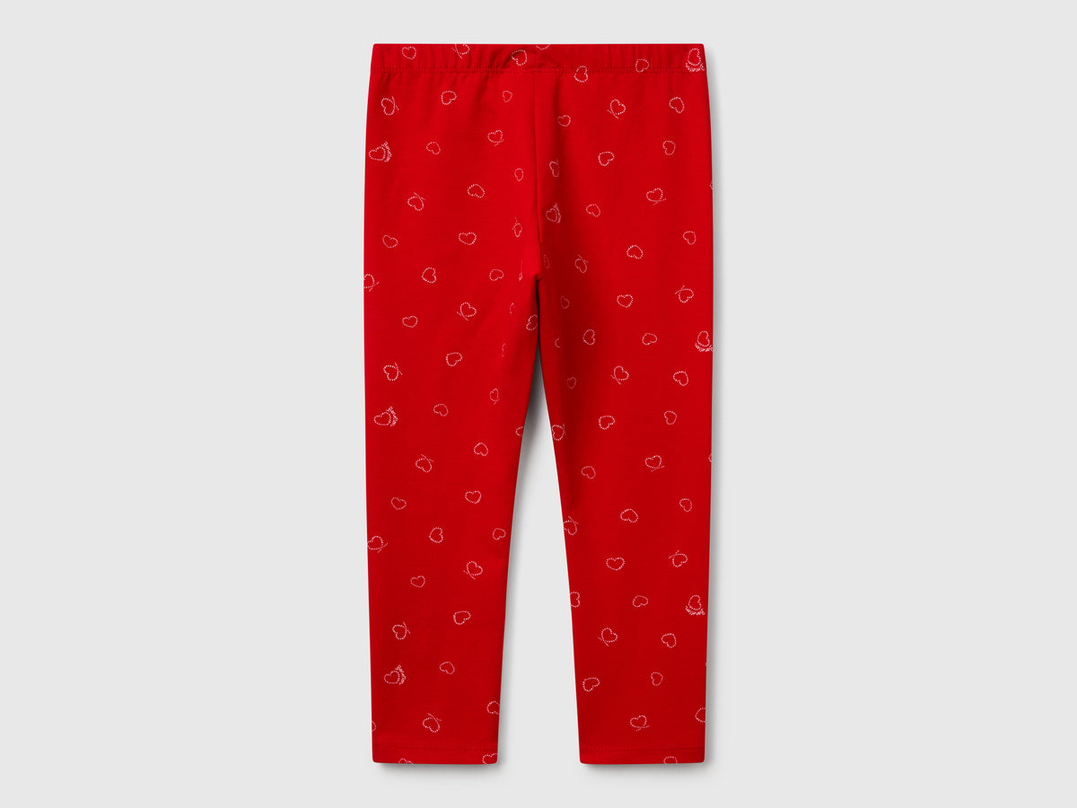 Leggings rossi con stampa cuori