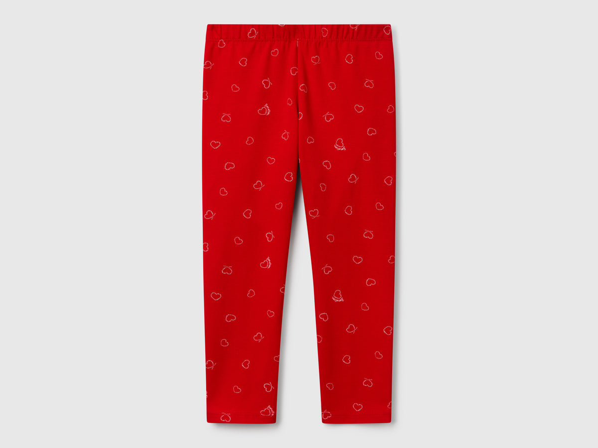 Leggings rossi con stampa cuori